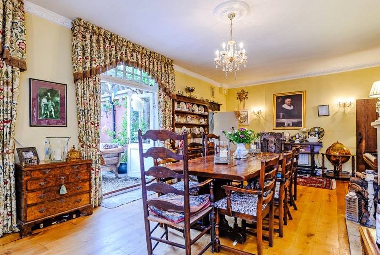 A breakfast room with a four-chair dining table