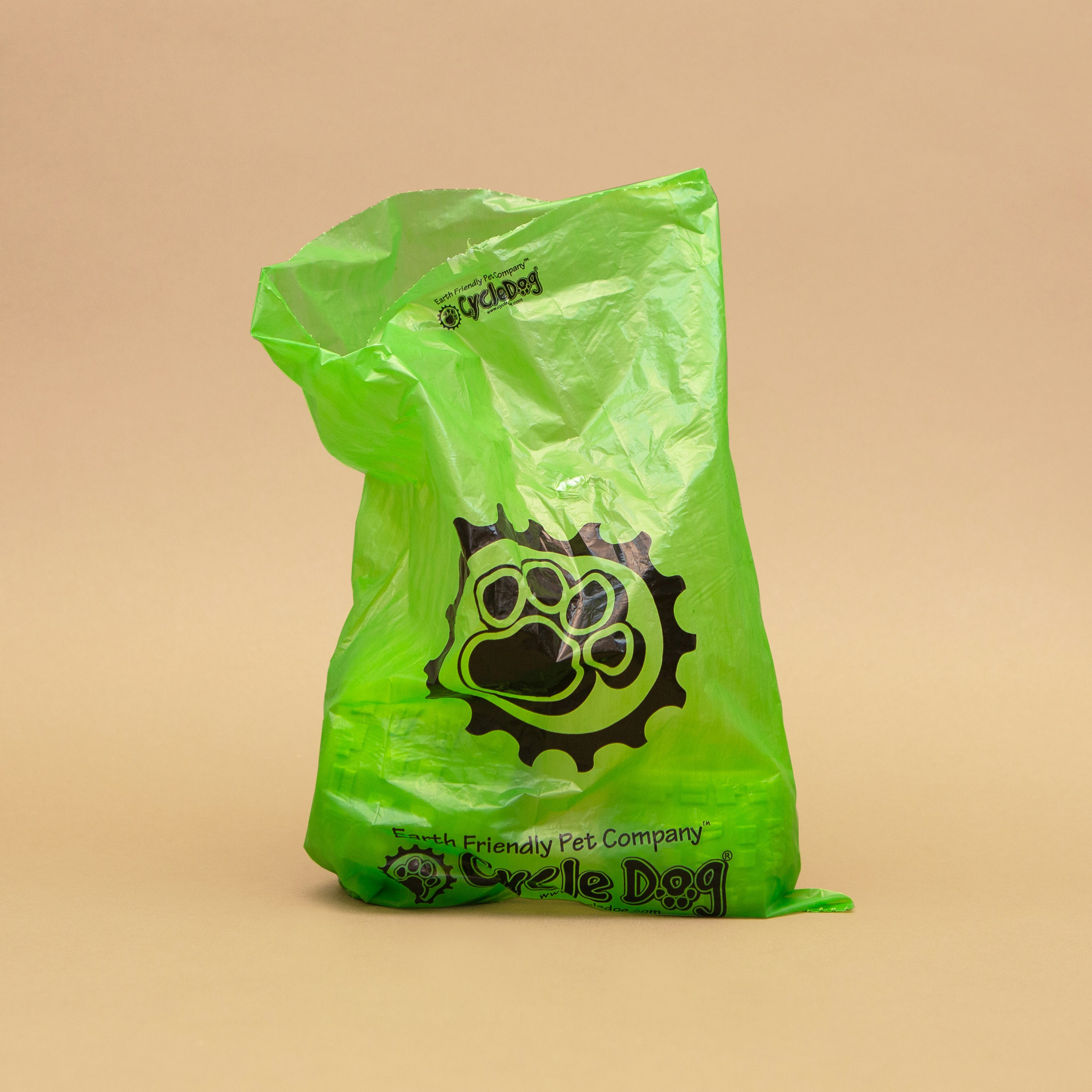 A green translucent dog-poop bag
