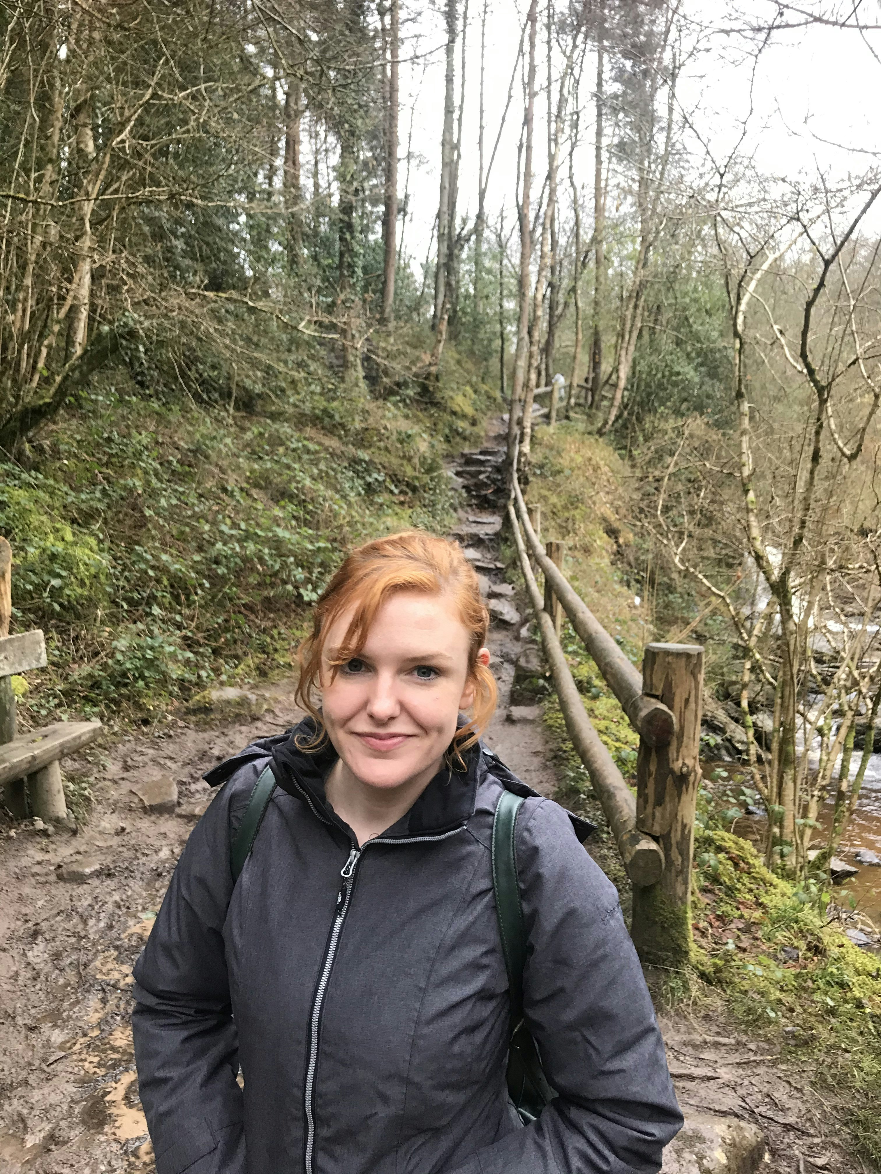 AnneMarie McCarthy on a woodland path in Ireland's Slieve Bloom Mountains.