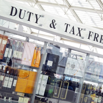 liquor bottles in a duty-free shop window