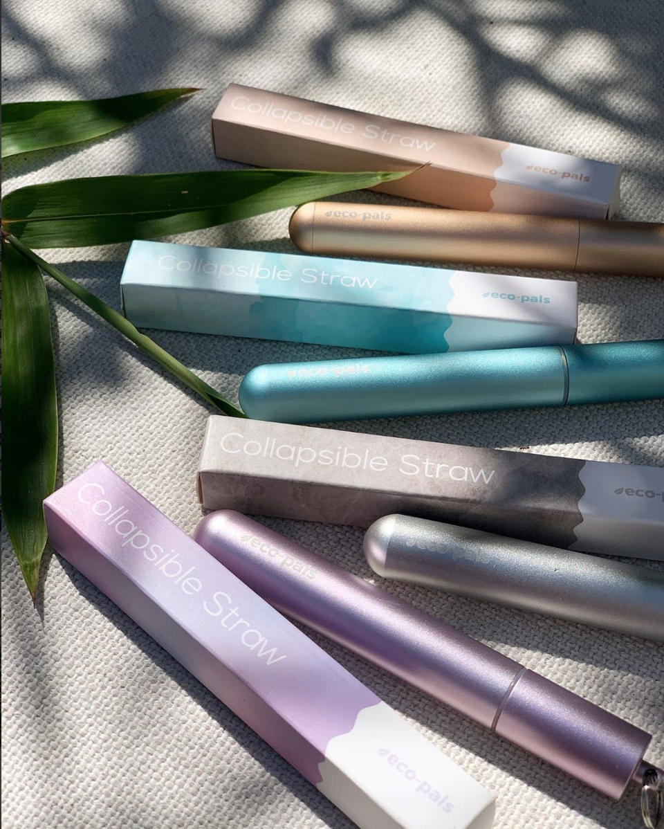 A collection of Eco-Pals reusable straws in rose gold, seafoam, silver, and unicorn