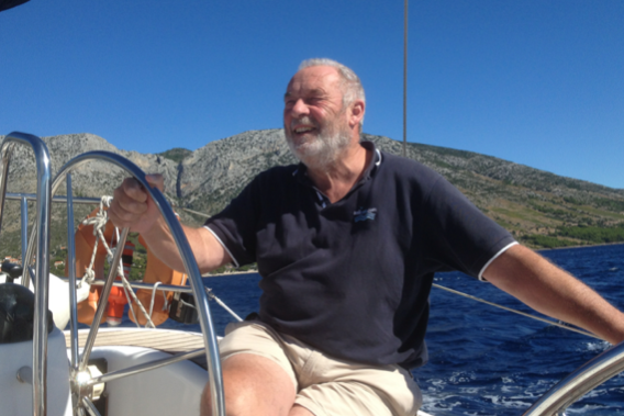 Eddie English sailing a boat in Croatia