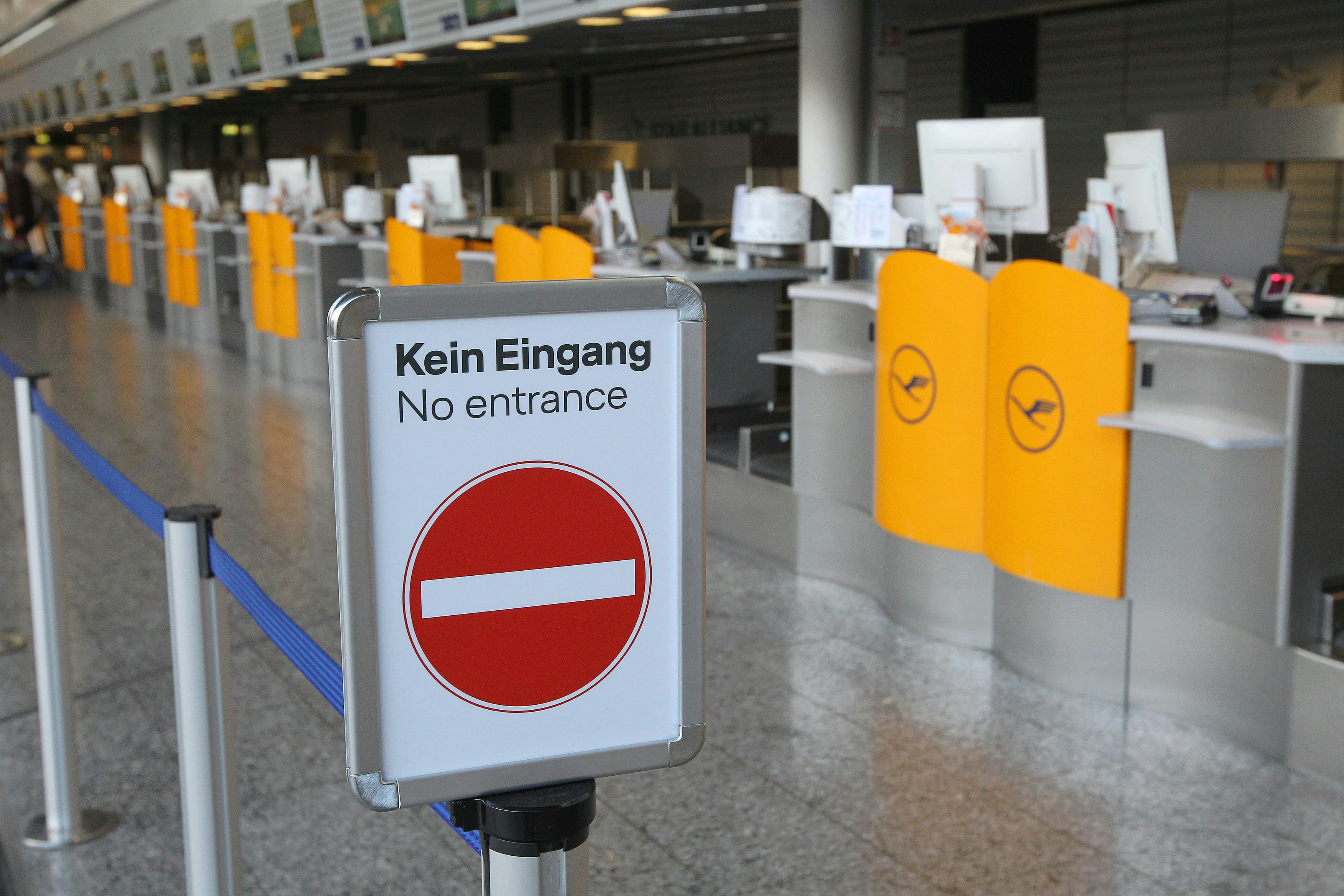Empty Lufthansa counters are seen at the airport in Frankfurt am Main
