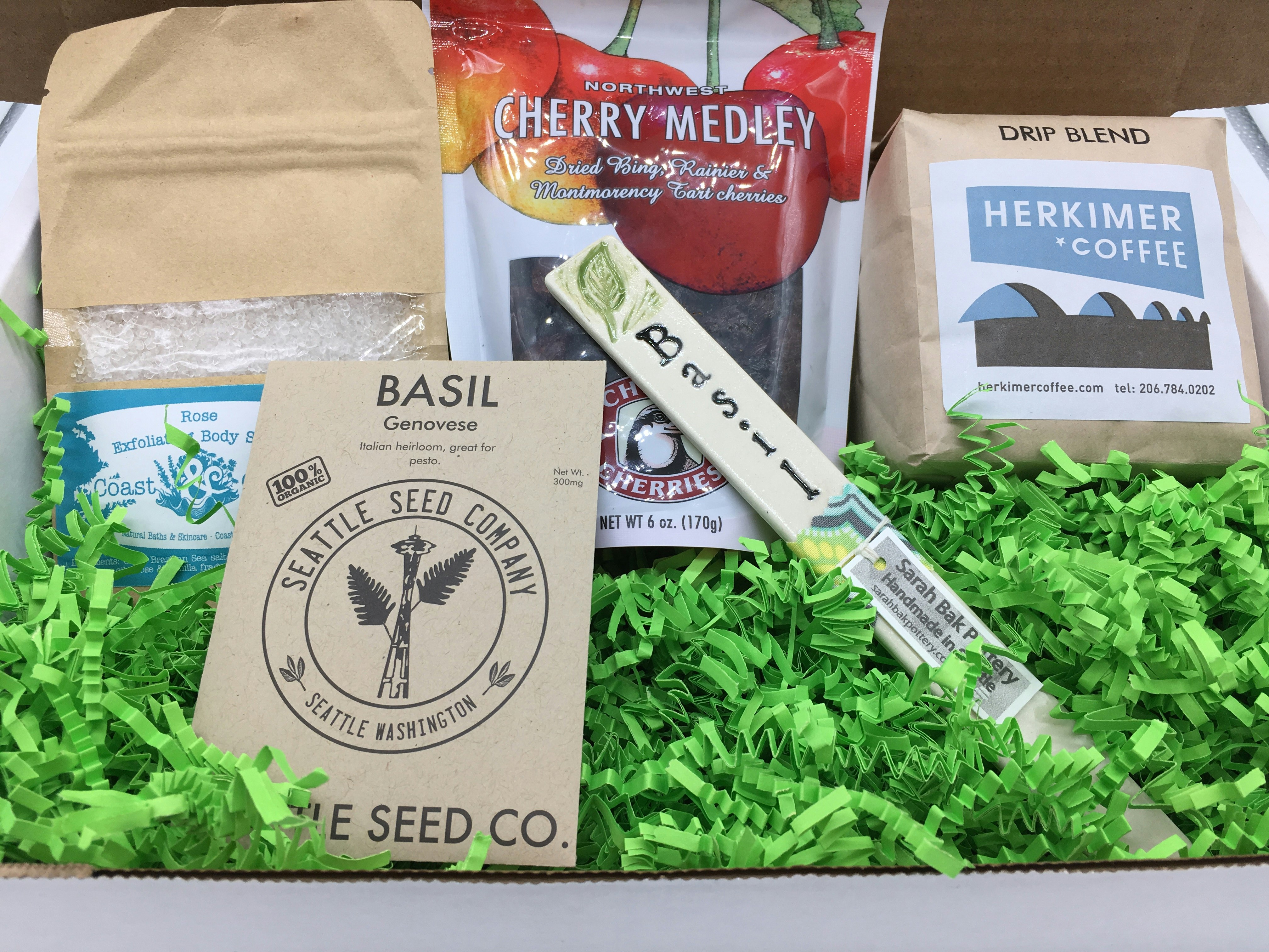 A box of Seattle-based products, including coffee and cherries
