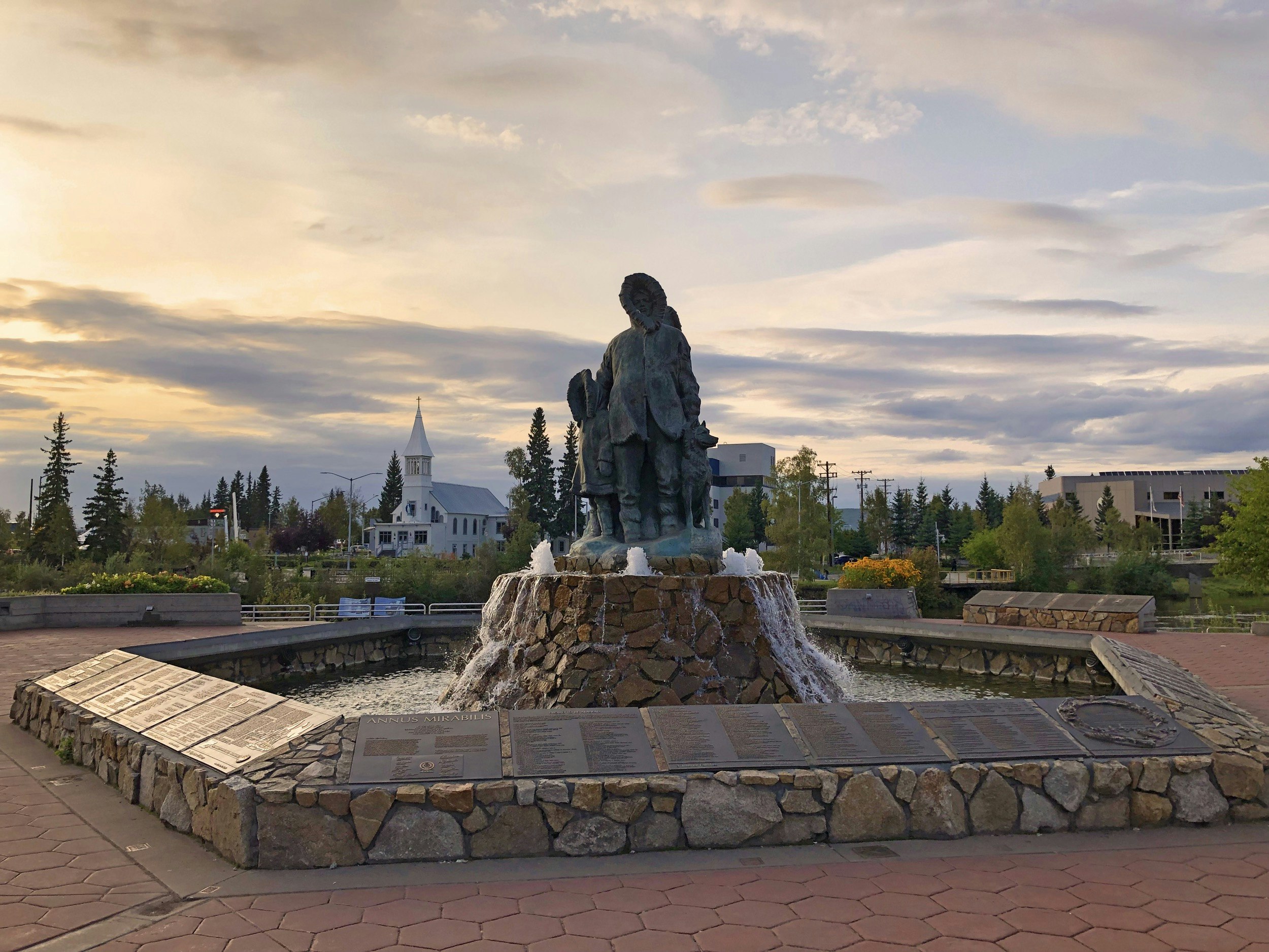 “Unknown First Family” sculpture in Golden Heart Plaza, Downtown, Fairbanks, Alaska 