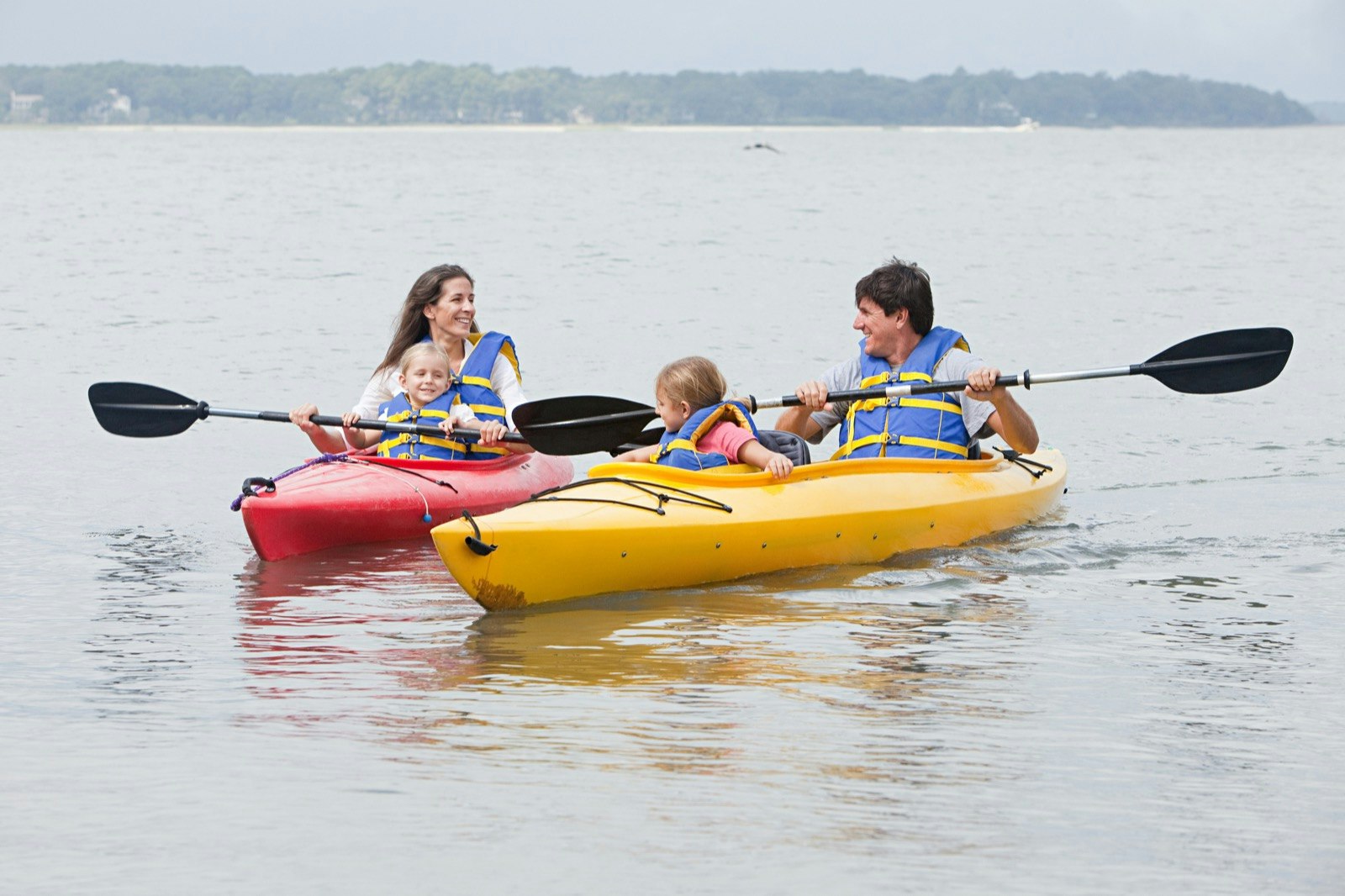 Family of four kayaking in Hilton Head Island, South Carolina