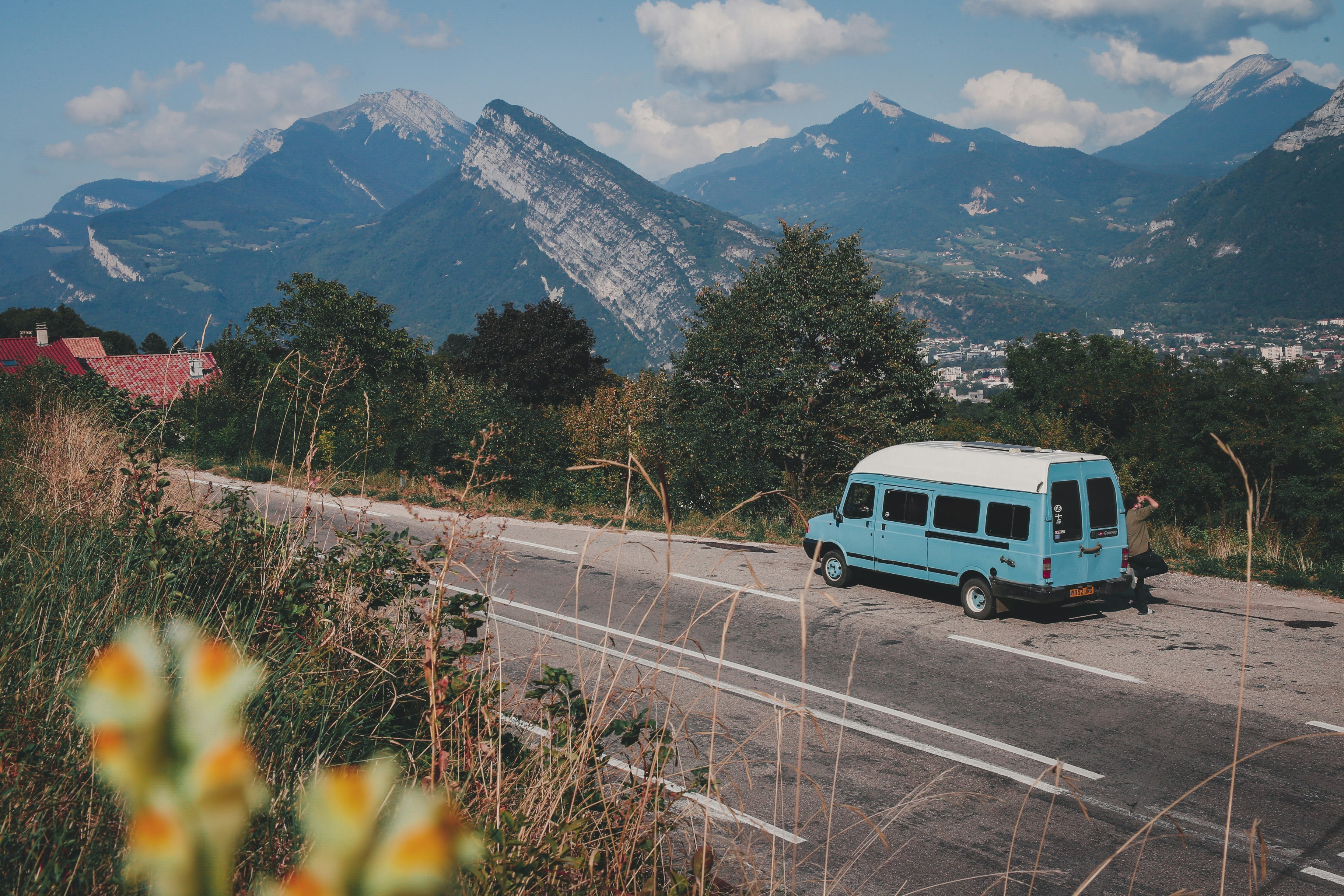 Lucy and Ben with their van in the French Alps