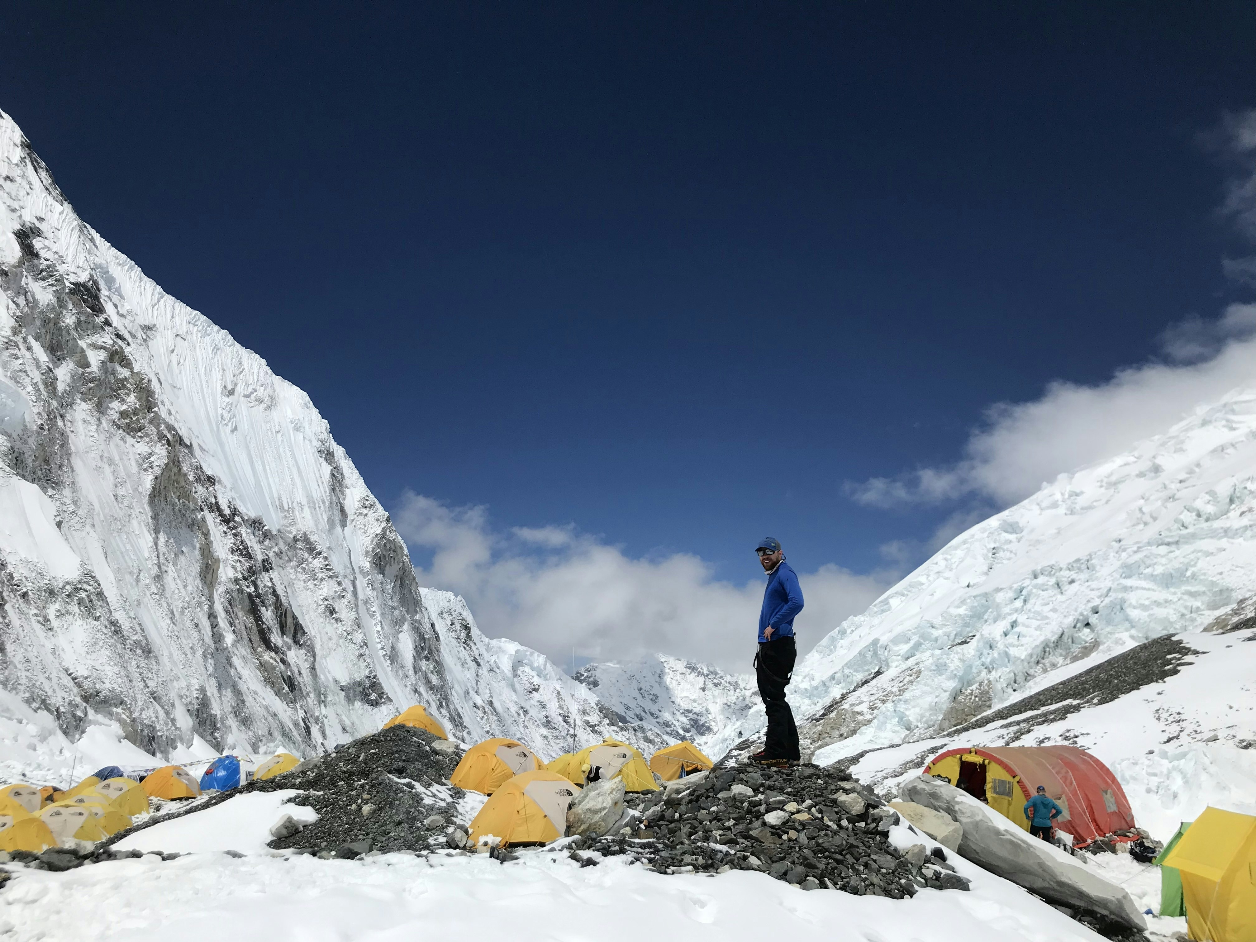 Alex Pancoe standing in a snowy camp.jpg