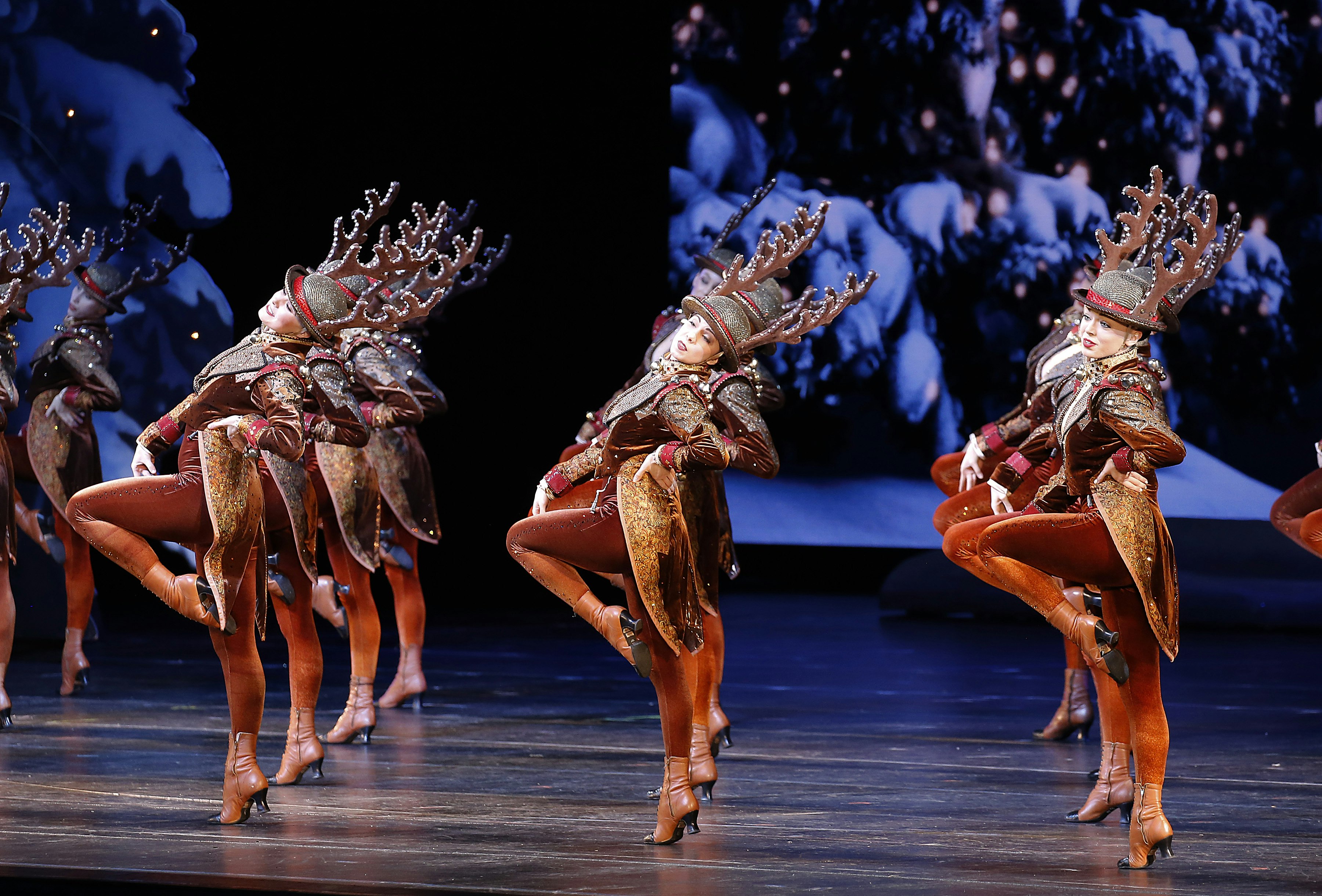 Rockettes dressed as reindeer perform at Radio City Music Hall