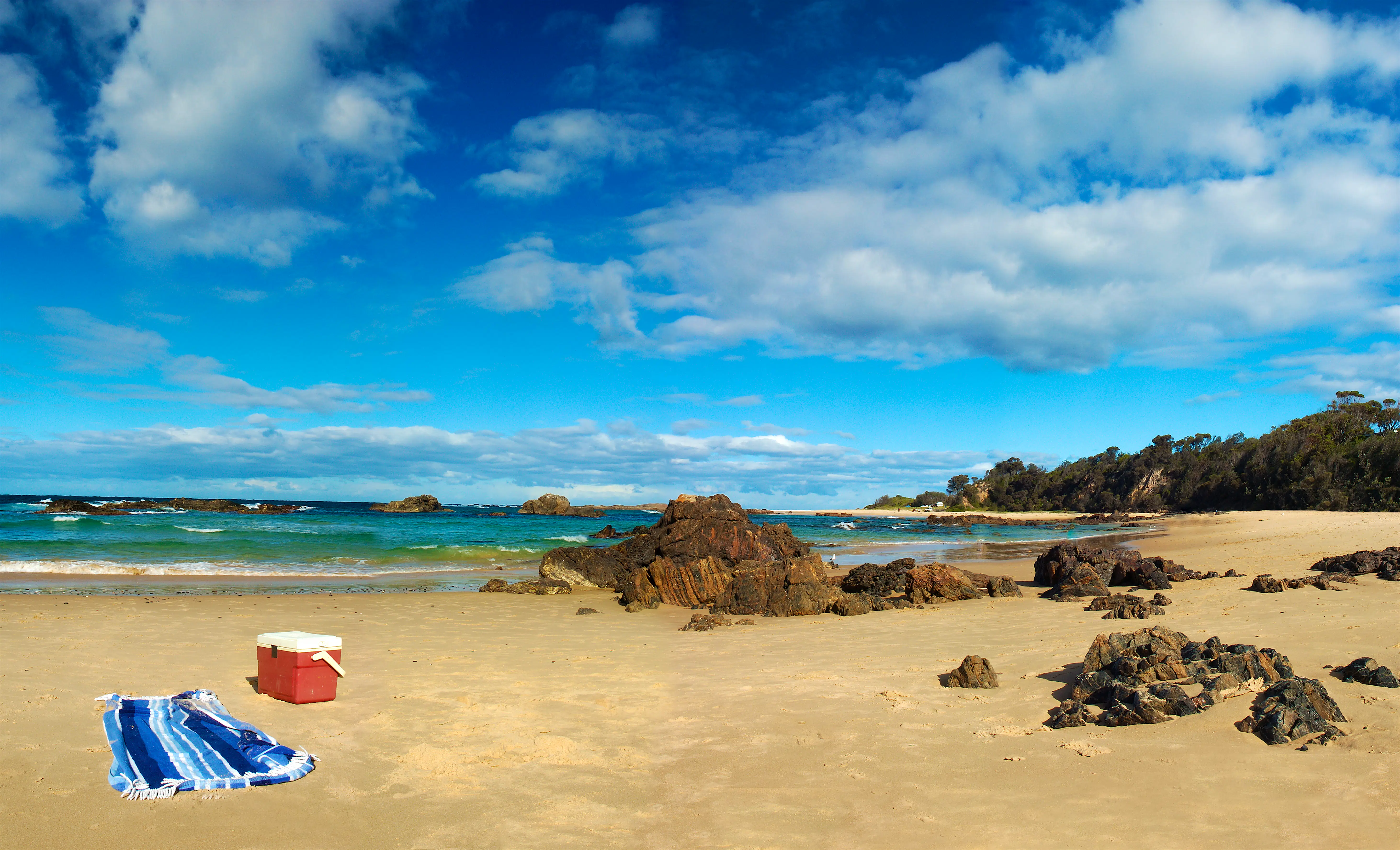 GettyImages-108881127.jpg An empty cooler sits on a beautiful beach