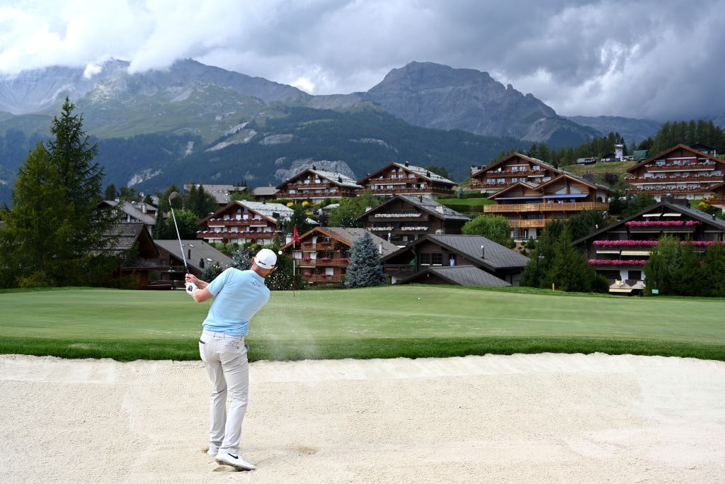 Sebastian Soderberg of Sweden plays a bunker shot on the fourteenth during Day Four of the Omega European Masters at Crans Montana Golf Club 
