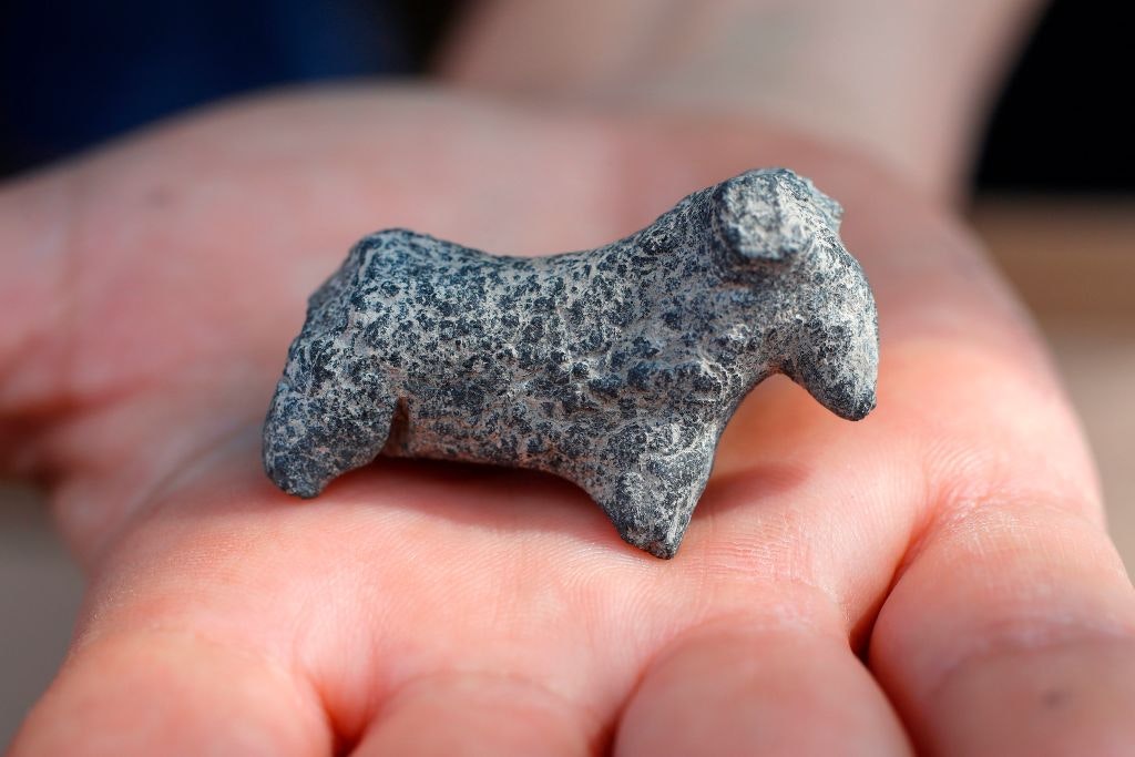 Small stone animal figurine from early Bronze Age era