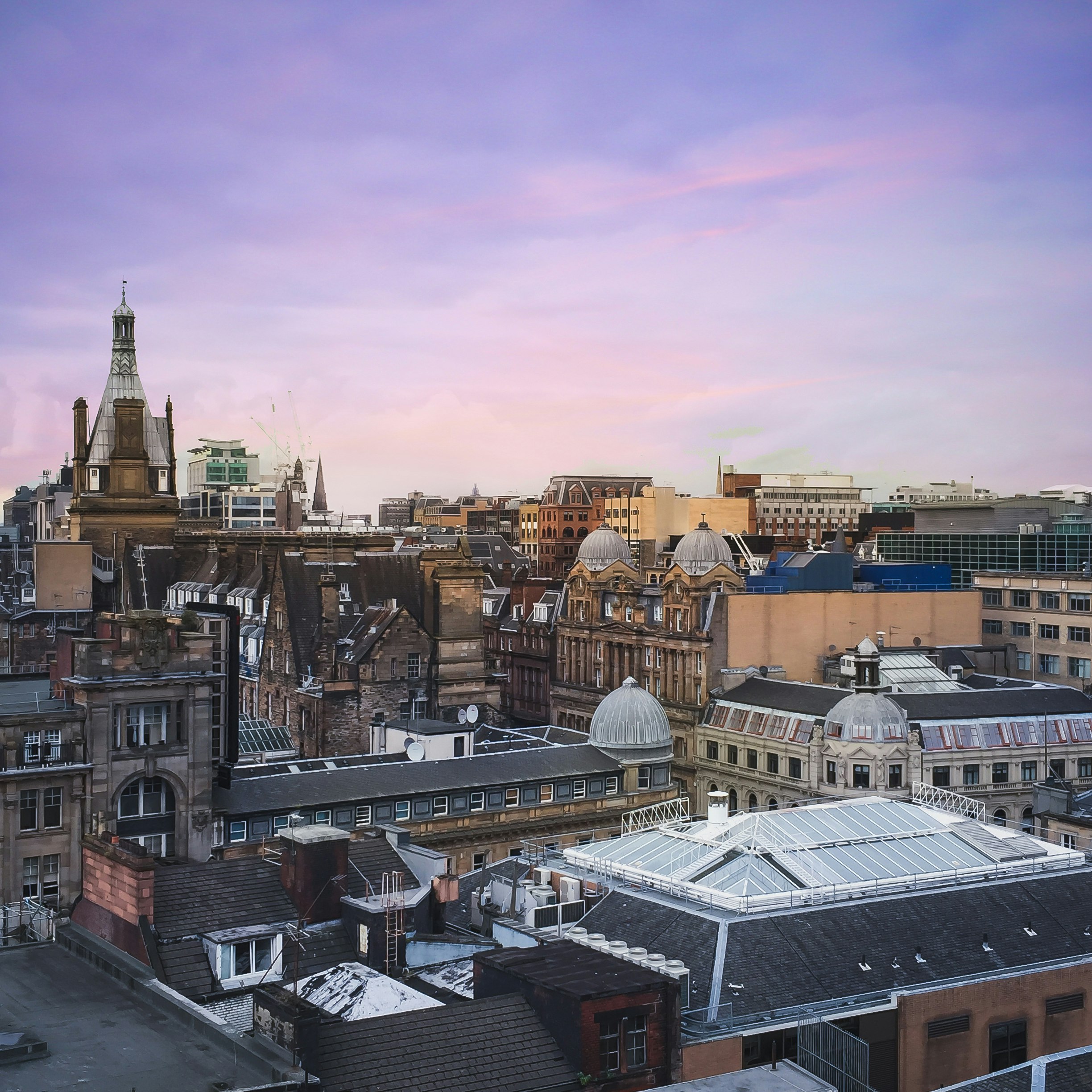 View of Glasgow's grey stone buildings and rooftops from The Lighthouse.