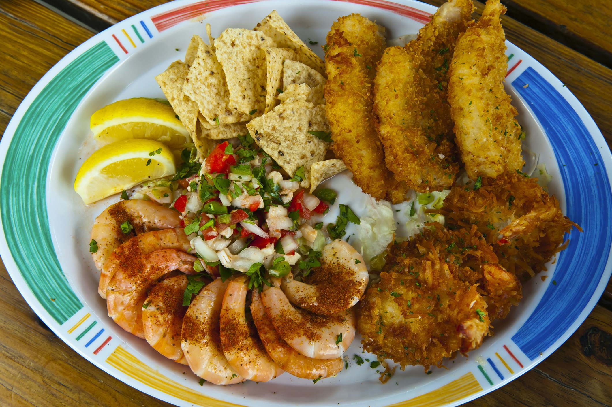 Seafood plate with Key West Pink Shrimp, Conch Ceviche, Fried coconut shrimp and hogfish, Hogfish Bar & Grill