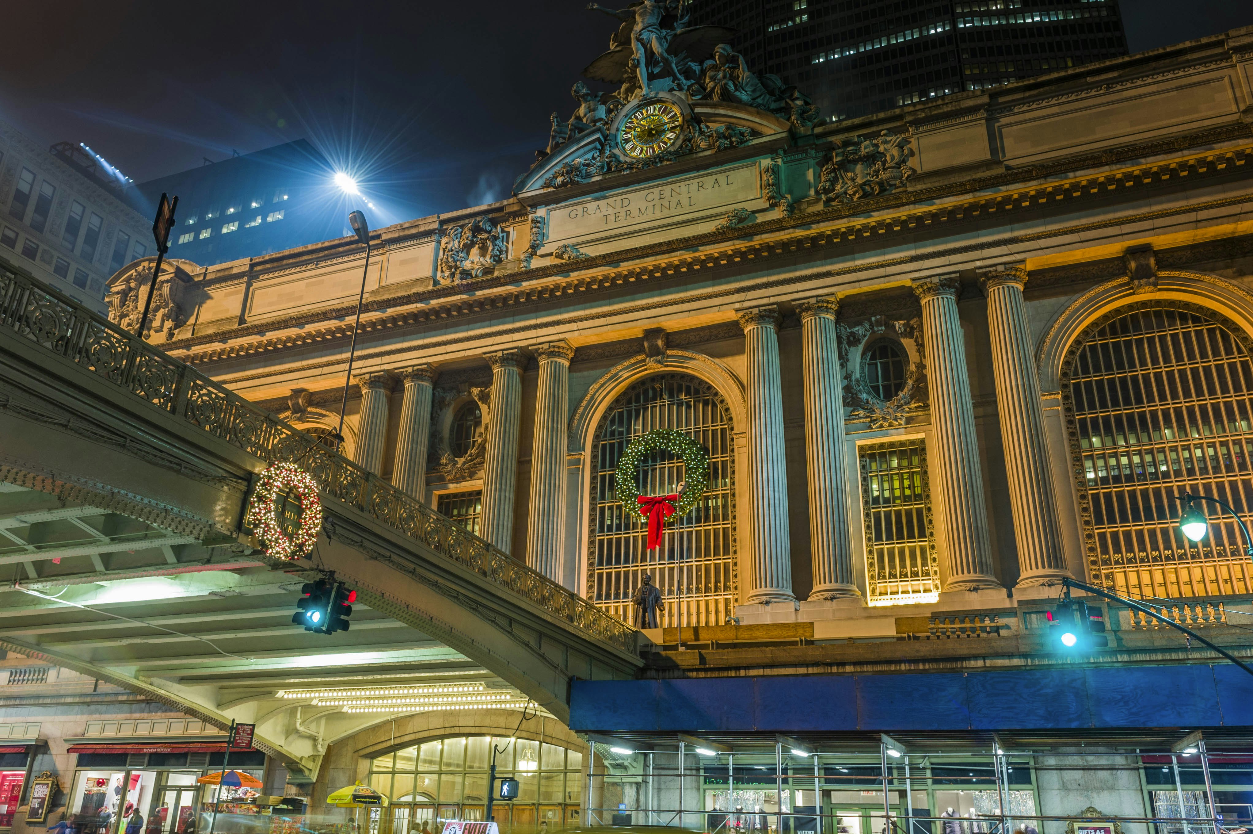 The facade of Grand Central Terminal adorned with Christmas wreaths