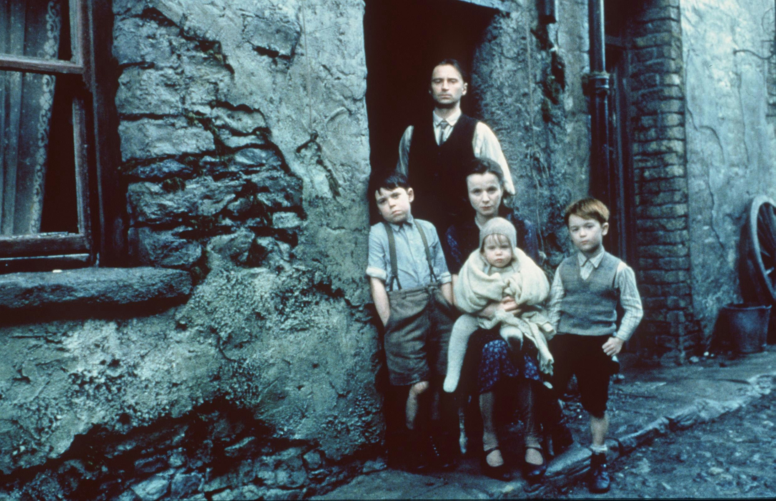 A still from the 1999 film adaptation of "Angela's Ashes," showing the actors cast to play author Frank McCourt's family