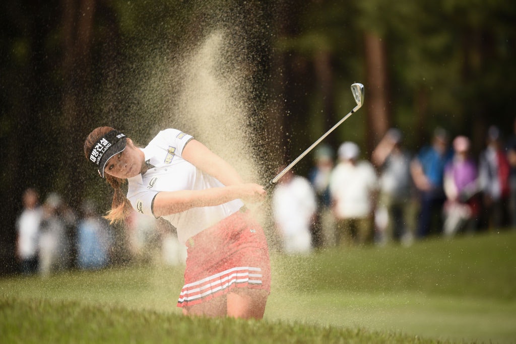 Jeong-Eun6 Lee of South Korea hits out of a 16th fairway bunker during the final round of the World Ladies Championship