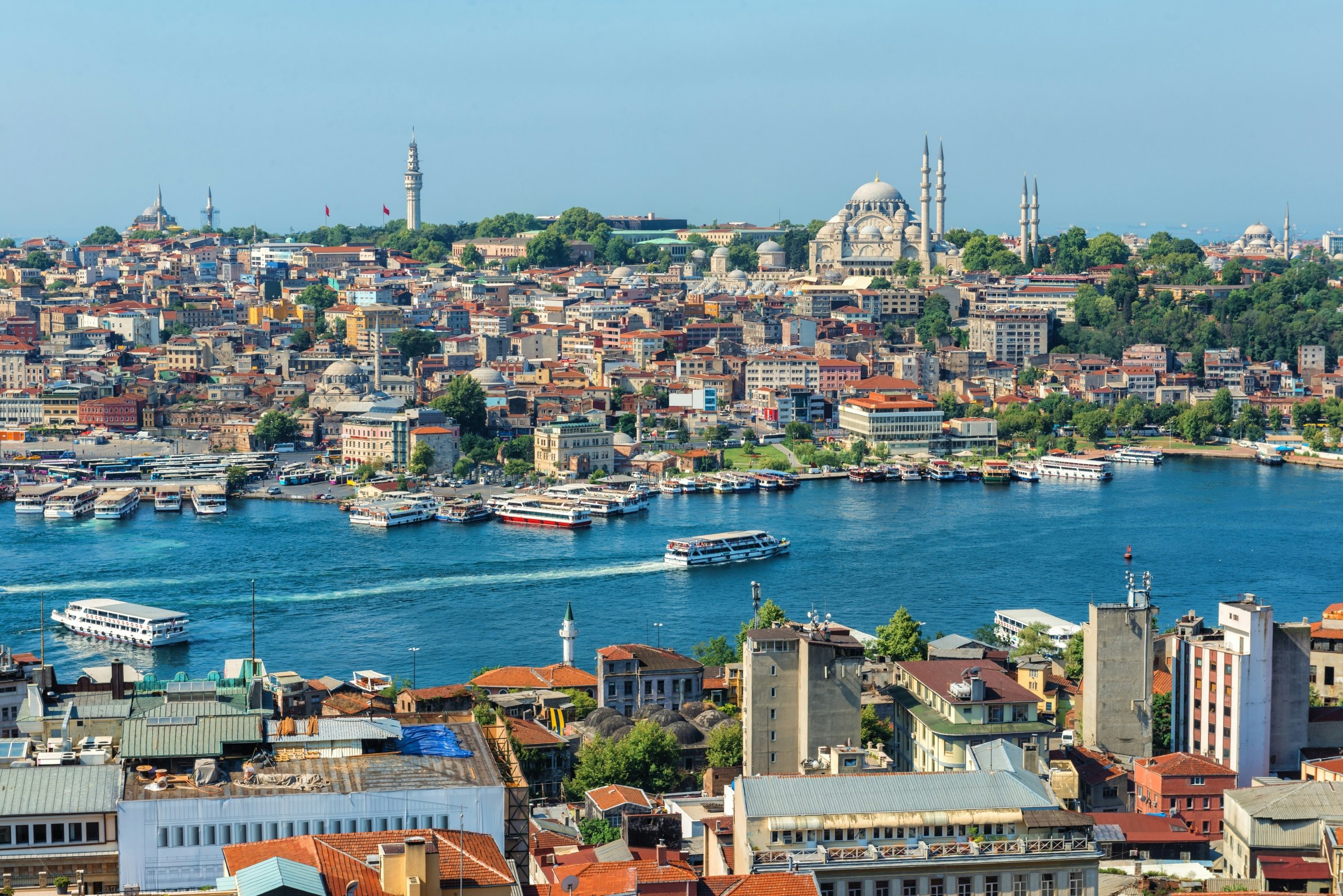Ferry ships sail up and down the Golden Horn in Istanbul, Turkey 