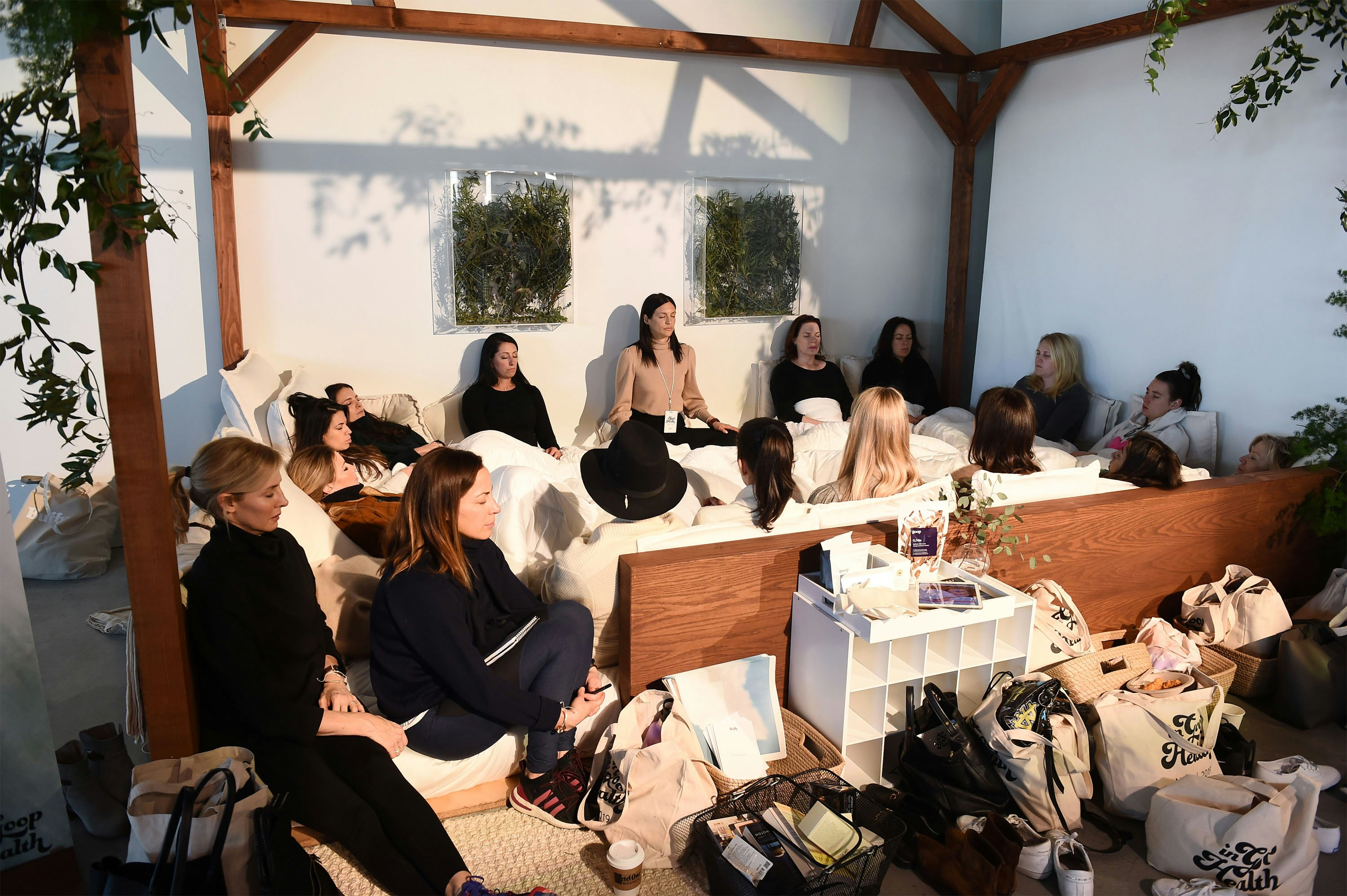 A group of woman attend a Goop Wellness Summit