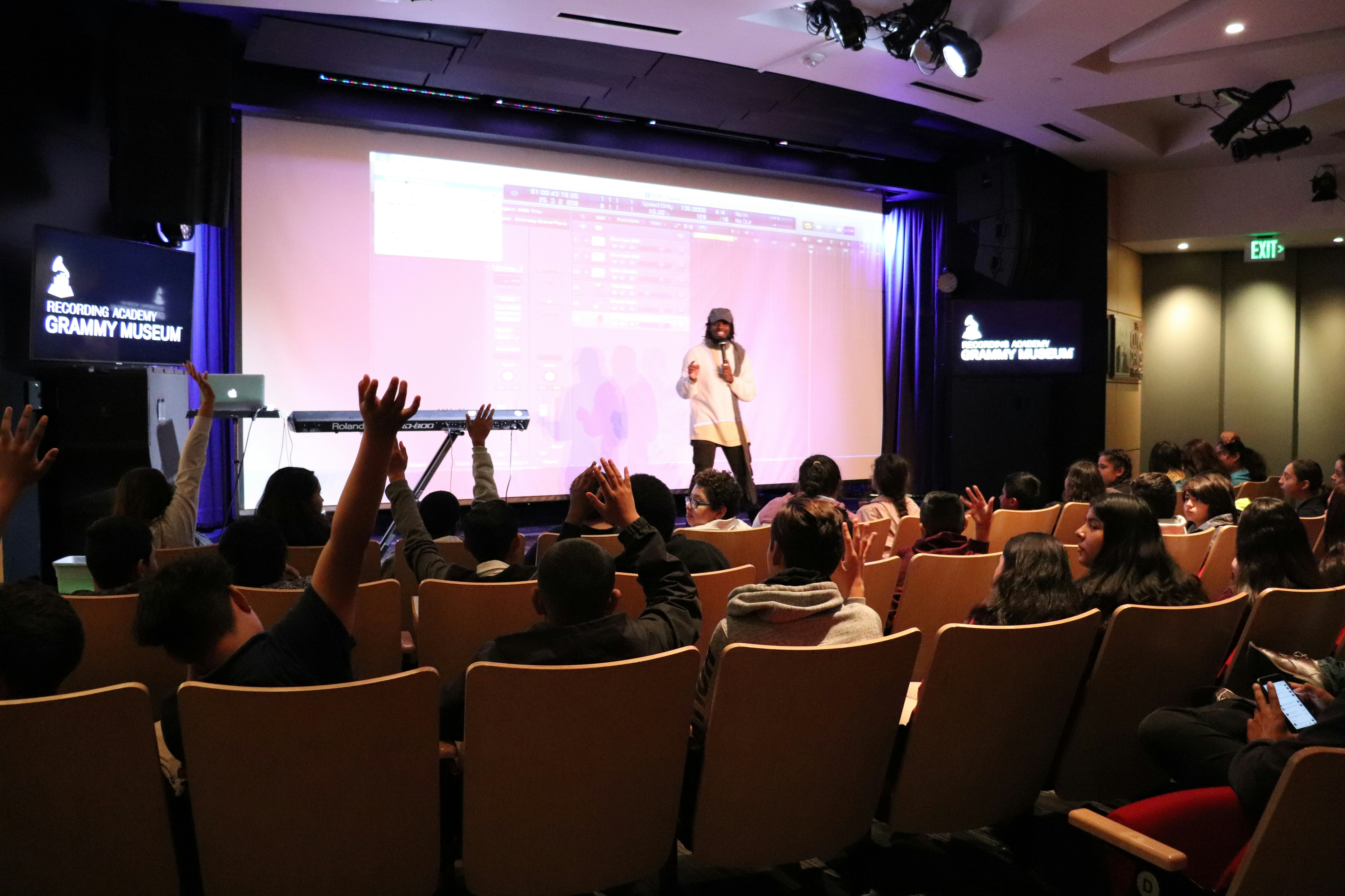 A class at the Grammy Museum, from the perspective of the audience looking at the stage