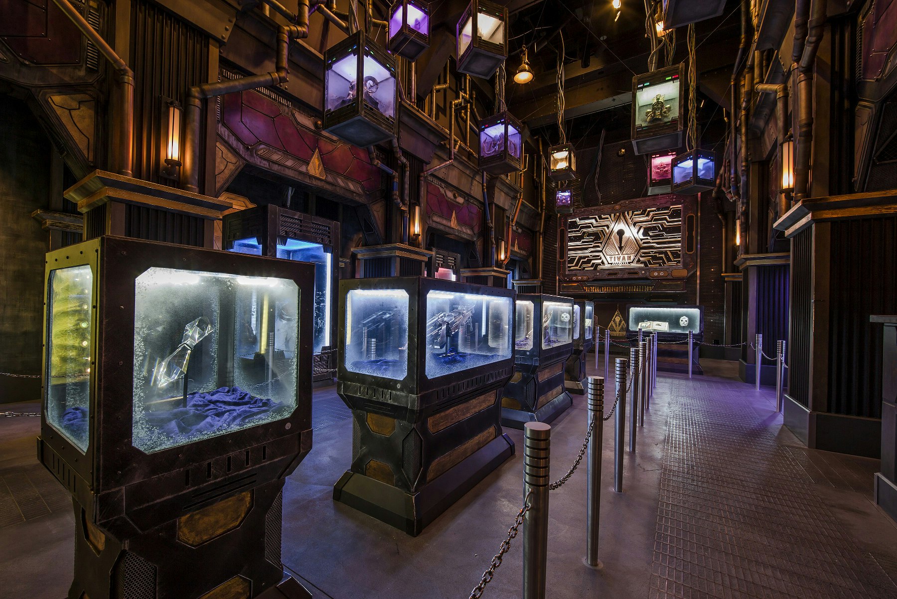 Artifacts from the movie Guardians of the Galaxy are stored behind glass cases in a set which resembles the film