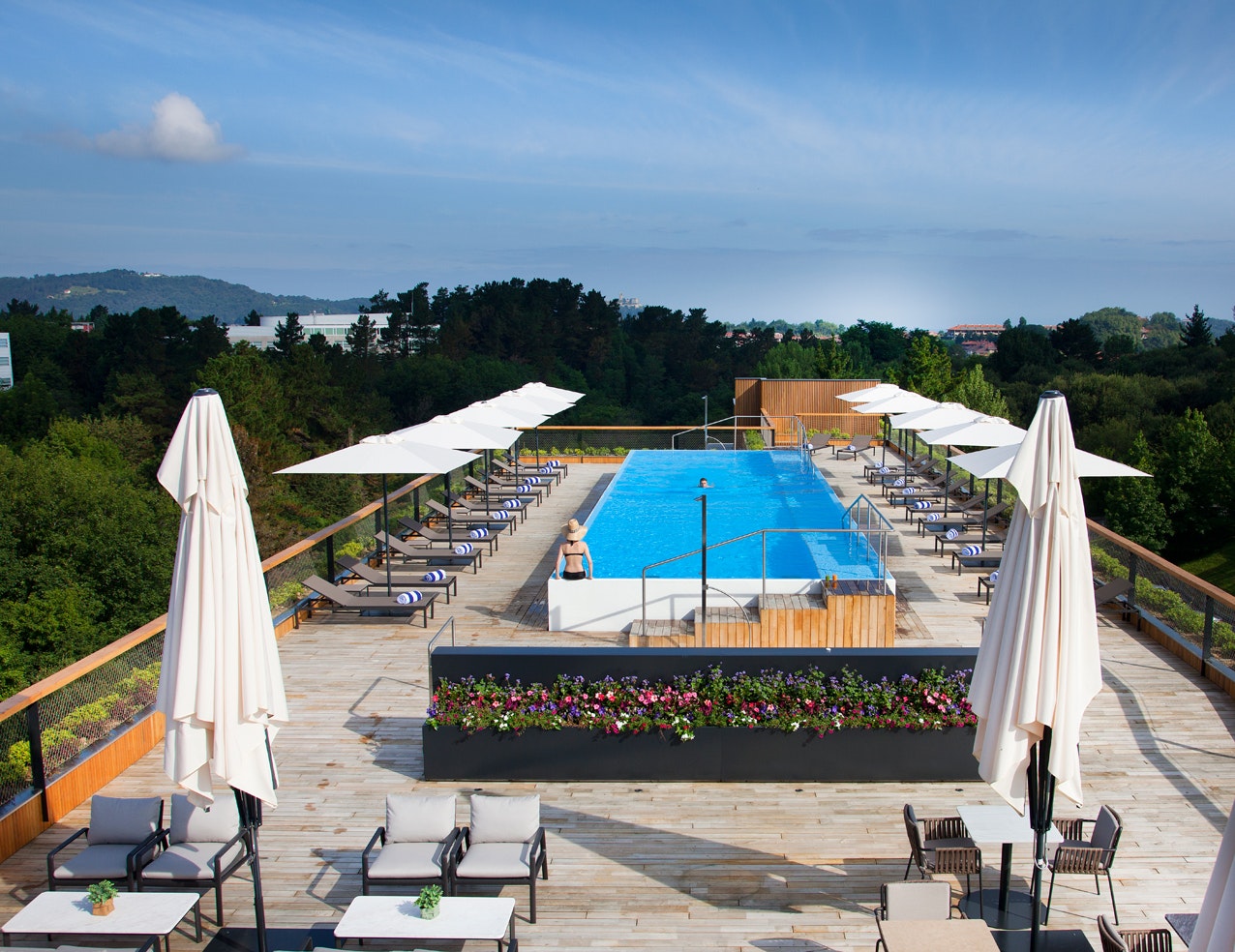 Rooftop pool with sun loungers.jpg