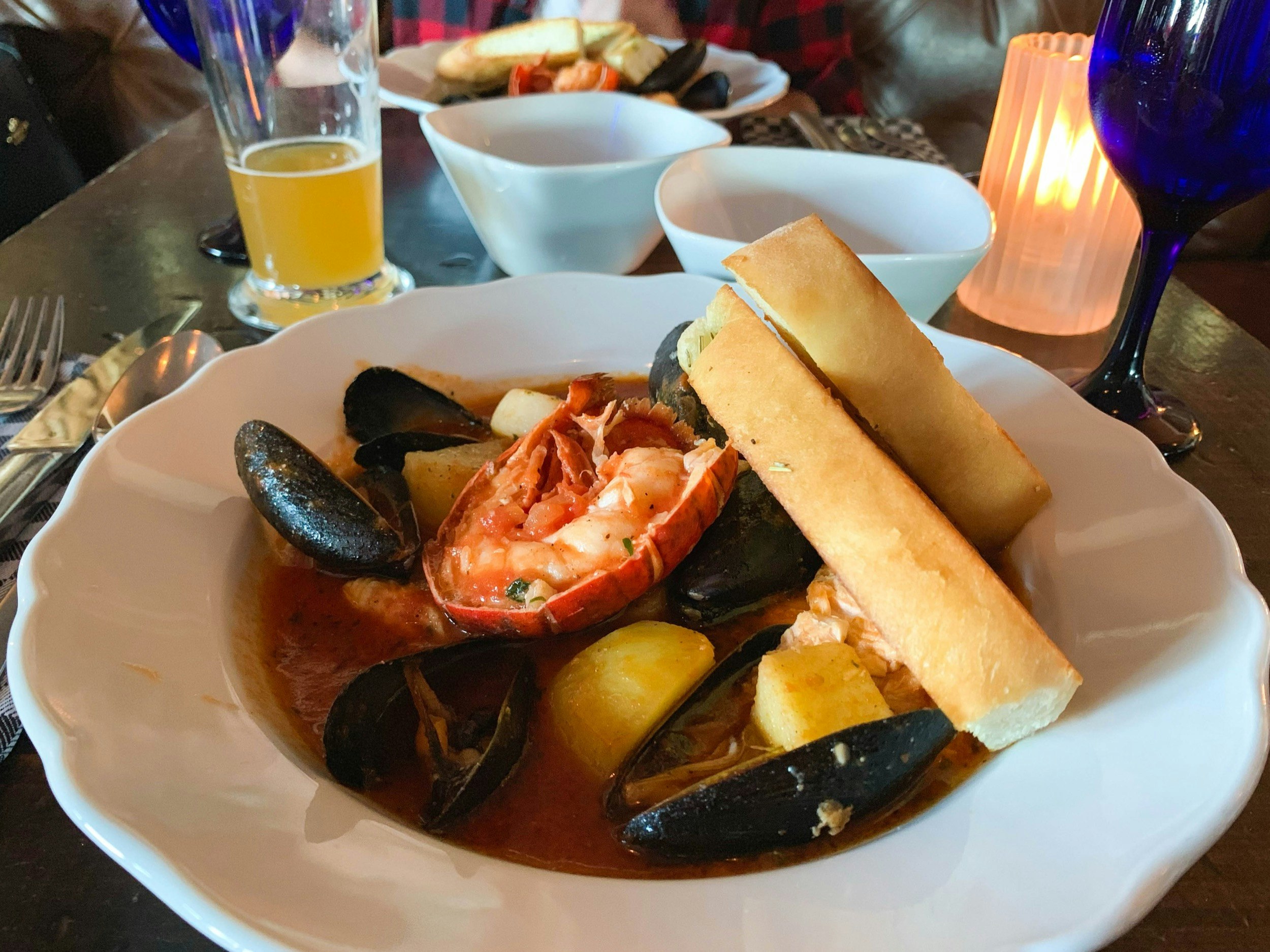 A plate of seafood stew with clams and other ingredients is seen at The Bicycle Thief in Halifax, Nova Scotia