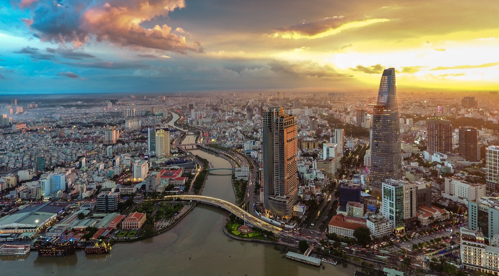 The financial district of the Ho Chi Minh City skyline with a river winding its way through the city
