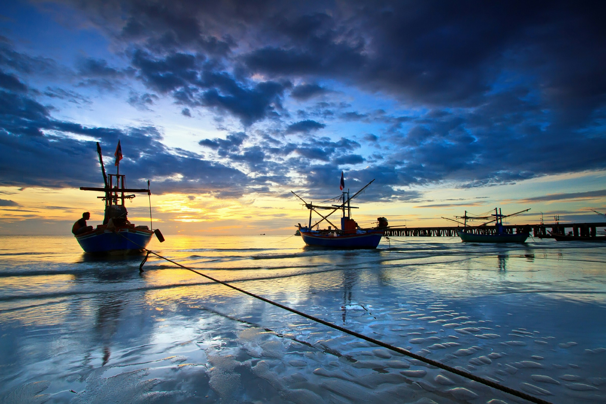 Fishing boats at the Hua Hin beach, Thailand 