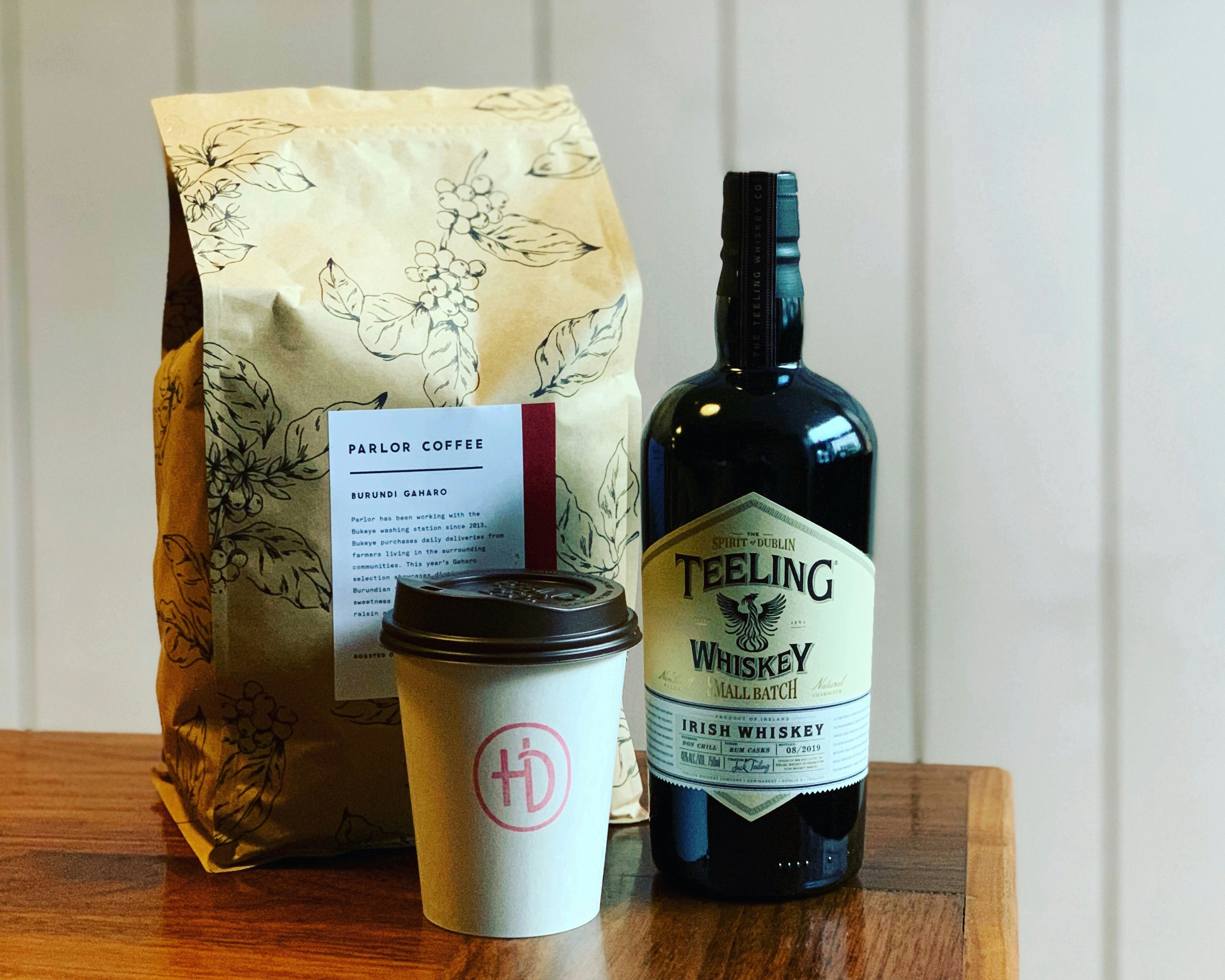 Hunky Dory's Irish coffee to go, with bag of coffee beans and bottle of Telling whiskey