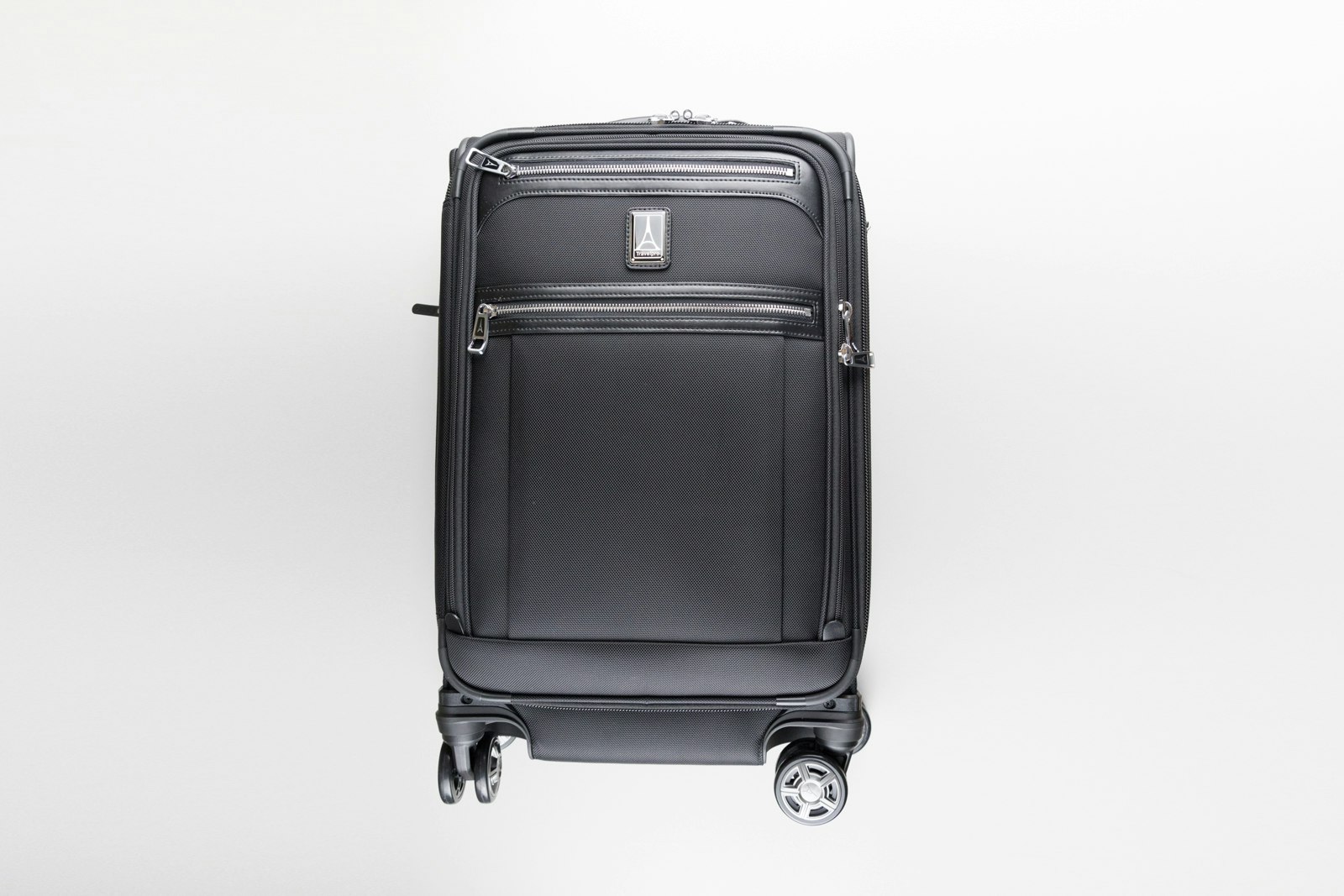 A product shot of the Travelpro Luggage Crew Spinner