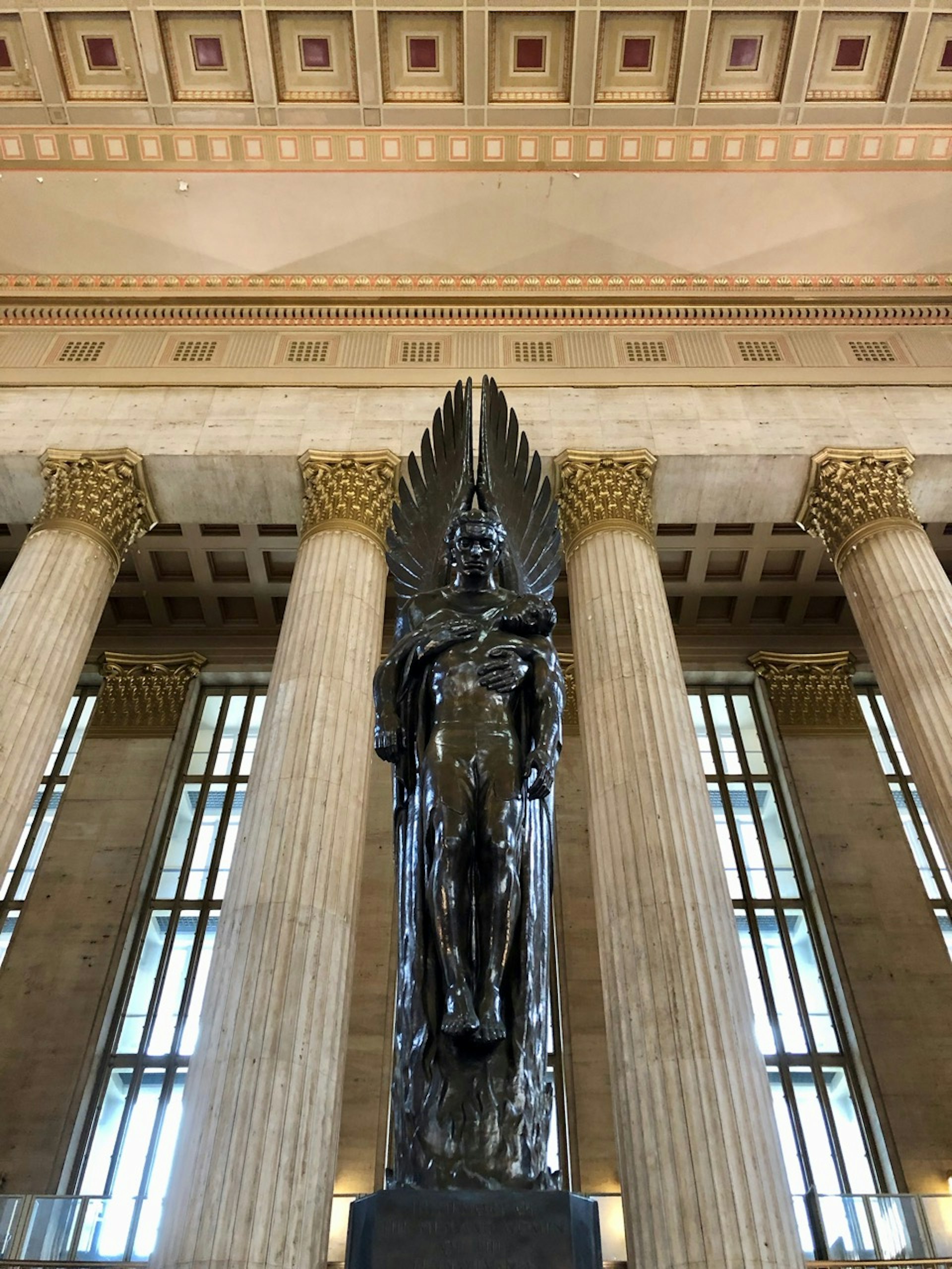 Walker Kirtland Hancock's Pennsylvania Railroad War Memorial at 30th Street Station in Philadelphia - the Archangel Michael in bronze, lifting a fallen soldier.