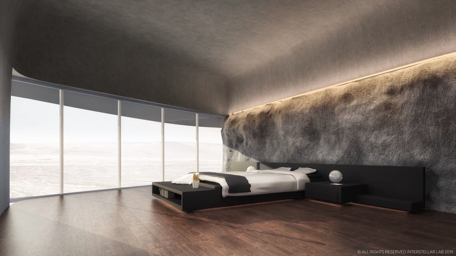 A minimalist room with dark-wood floors, floor-to-ceiling windows, a bed with a black frame, and tufted grey material on the wall behind the headboard