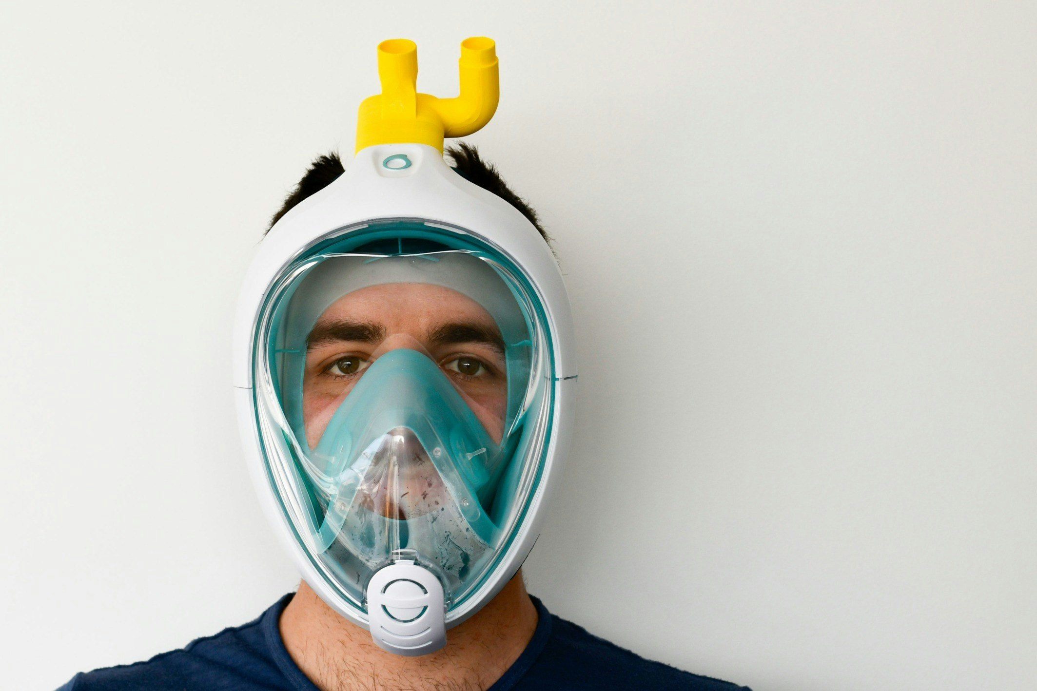A man wearing a snorkel mask 