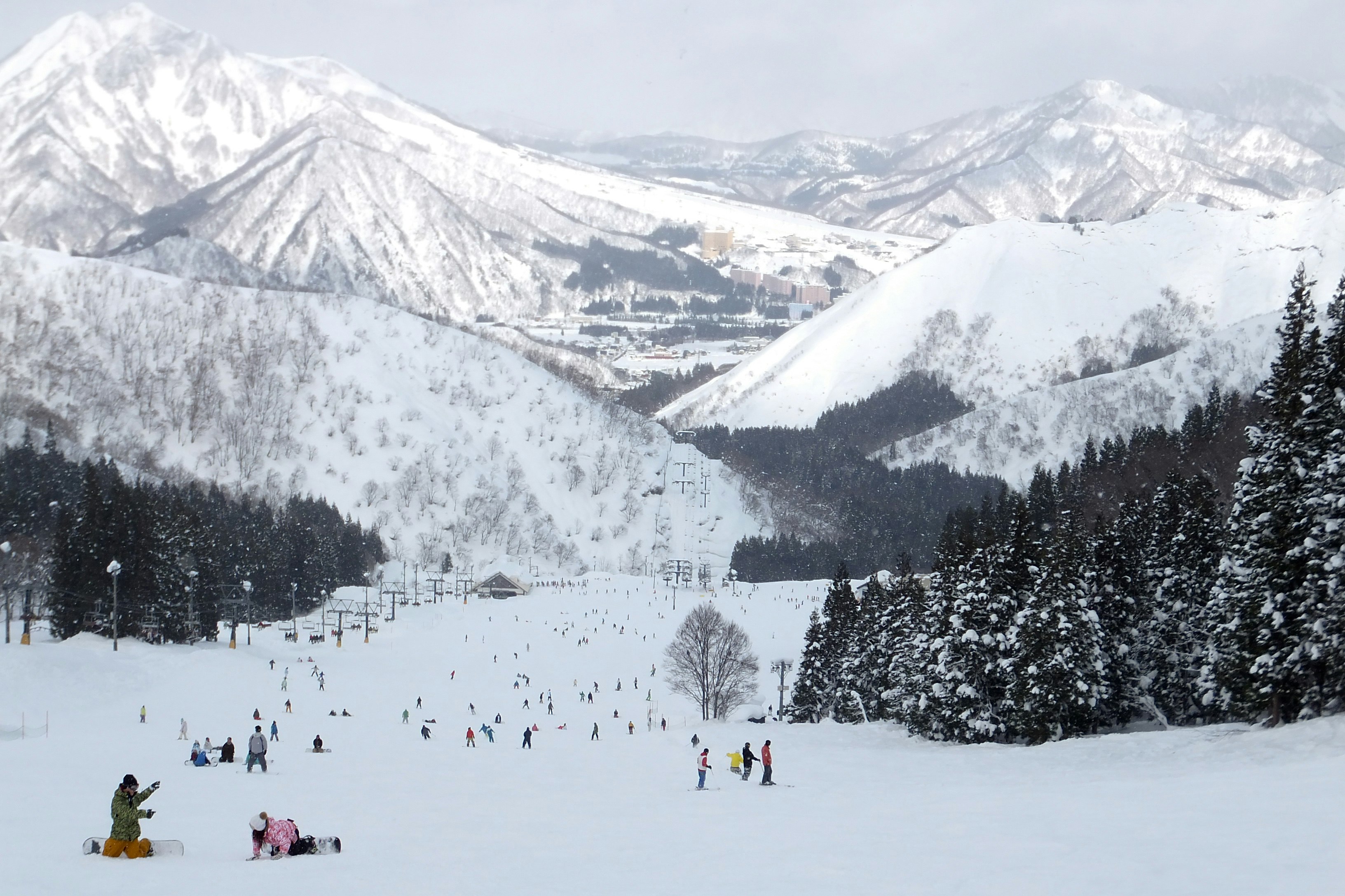 Children play on the slopes of Kandatsu Kogen ski area