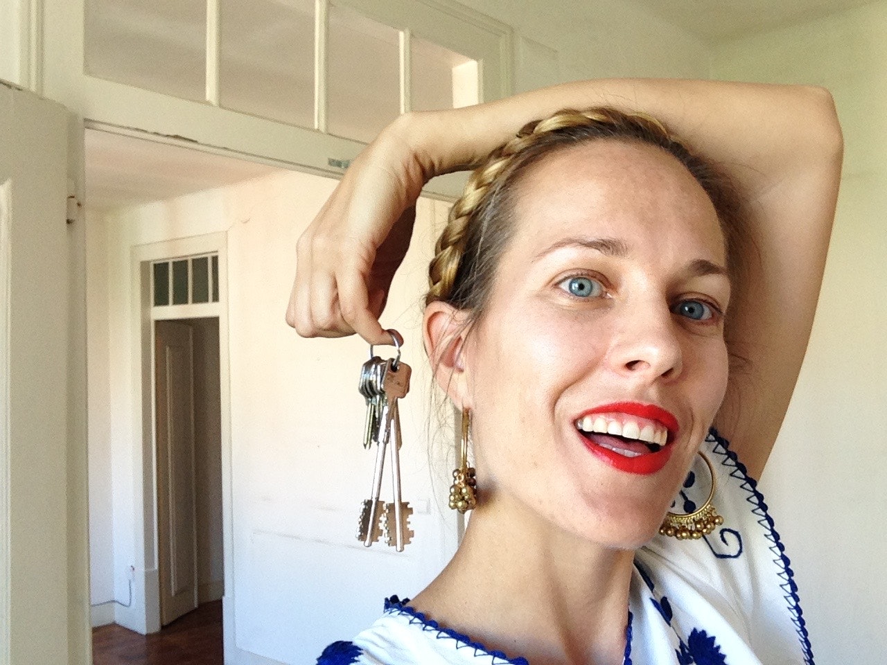A portrait of Jenny holding a set of keys
