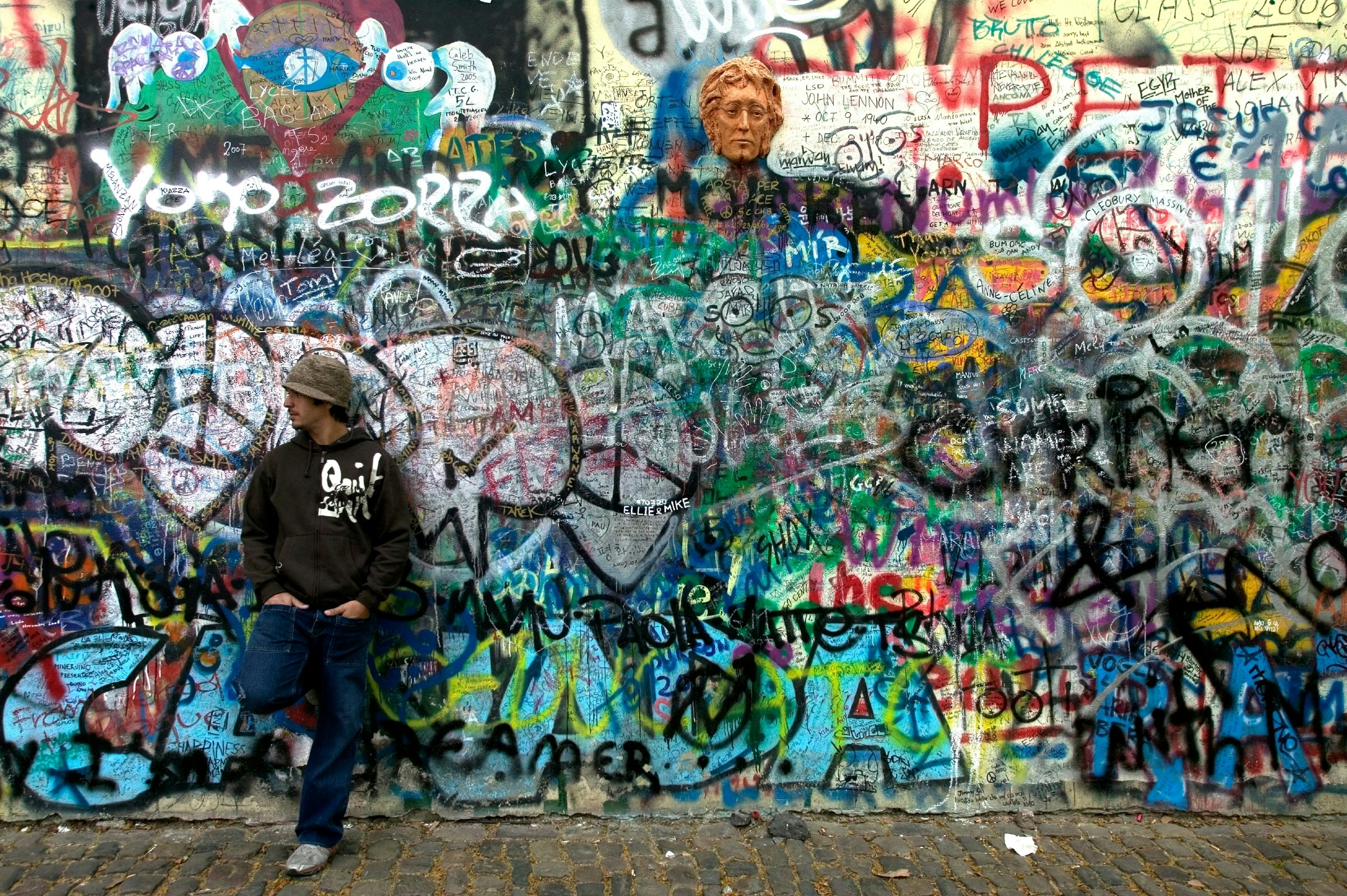 The John Lennon Wall in Prague, covered with graffiti tributes to the late singer