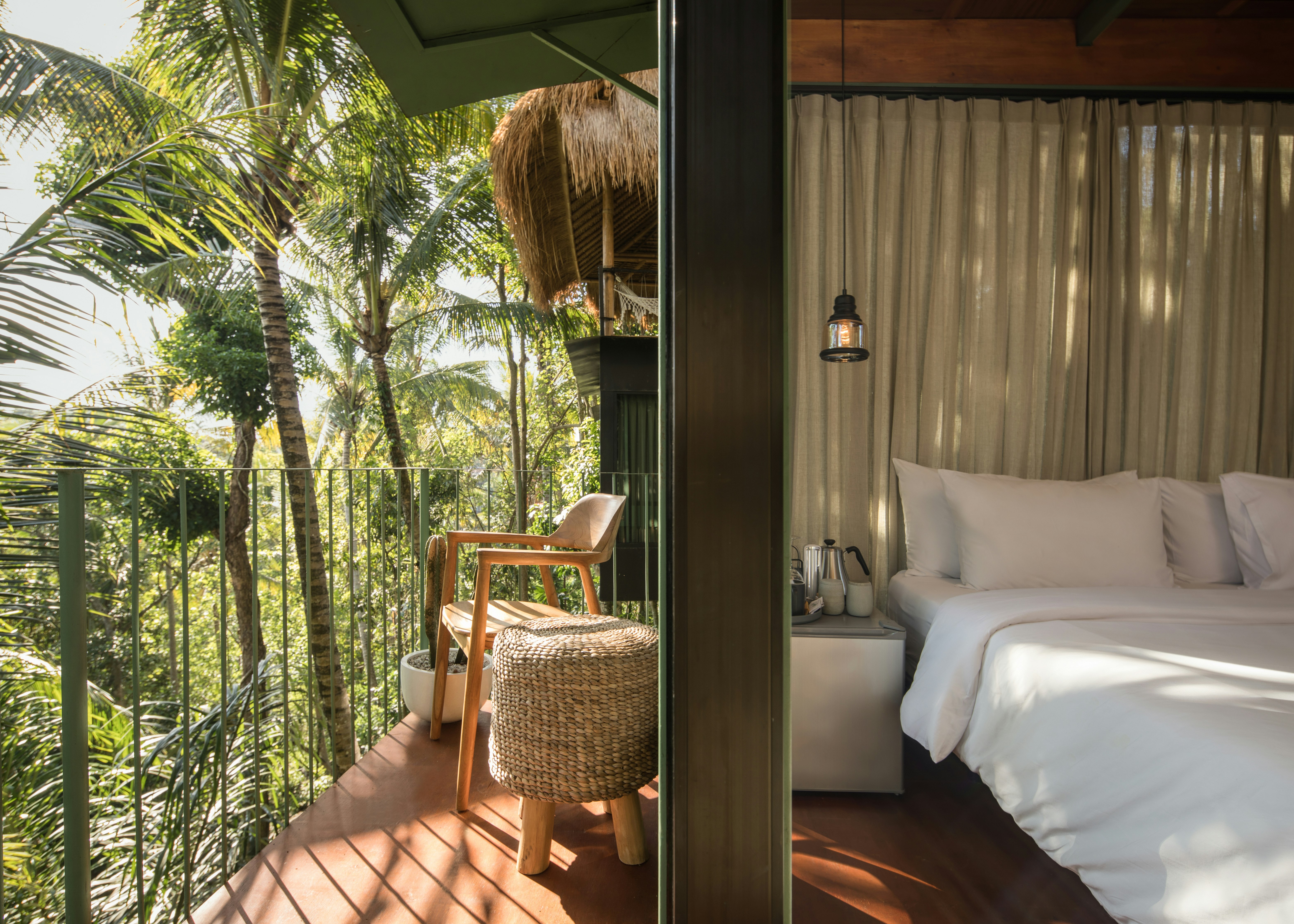 Balcony shot of a treetop lodge in a Balinese jungle