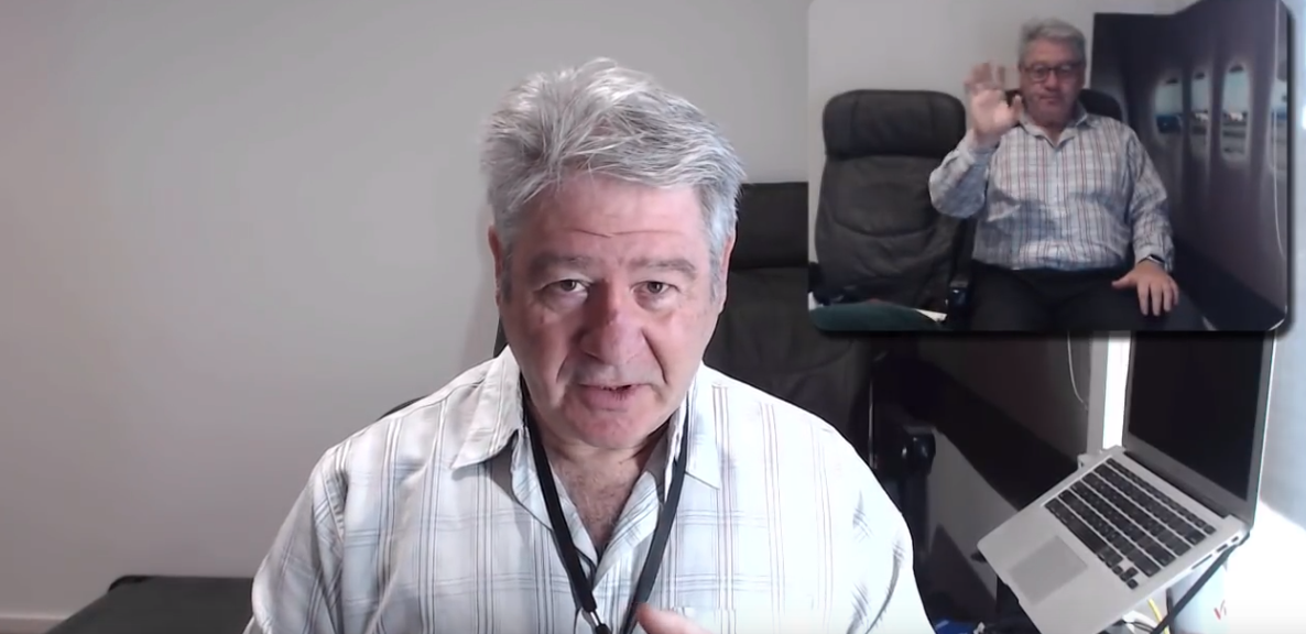 A screenshot of psychologist Les Posen in a YouTube video. In the top right there is an inset video which shows a passenger in an airplane cabin..