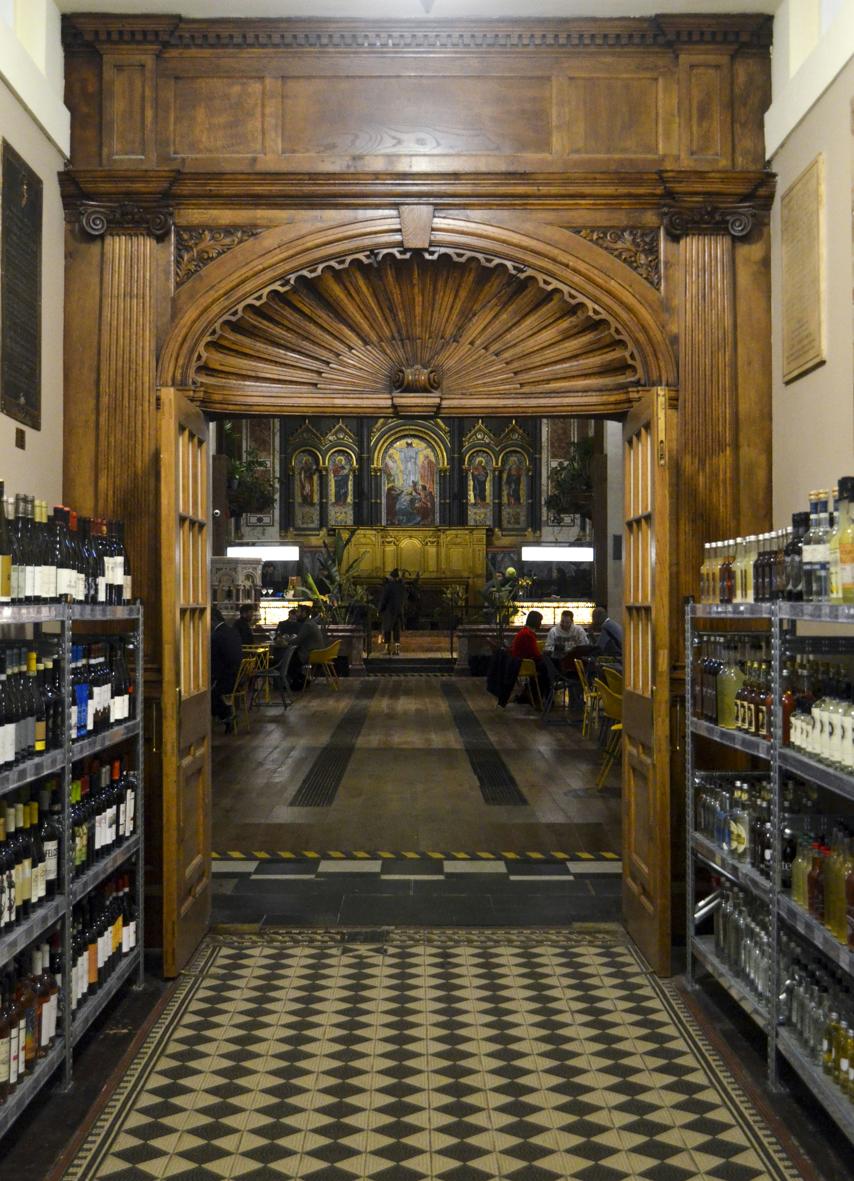A view from the wine bottle-lined entrance into the market.JPG