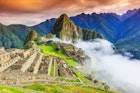Machu Picchu shrouded in clouds.
