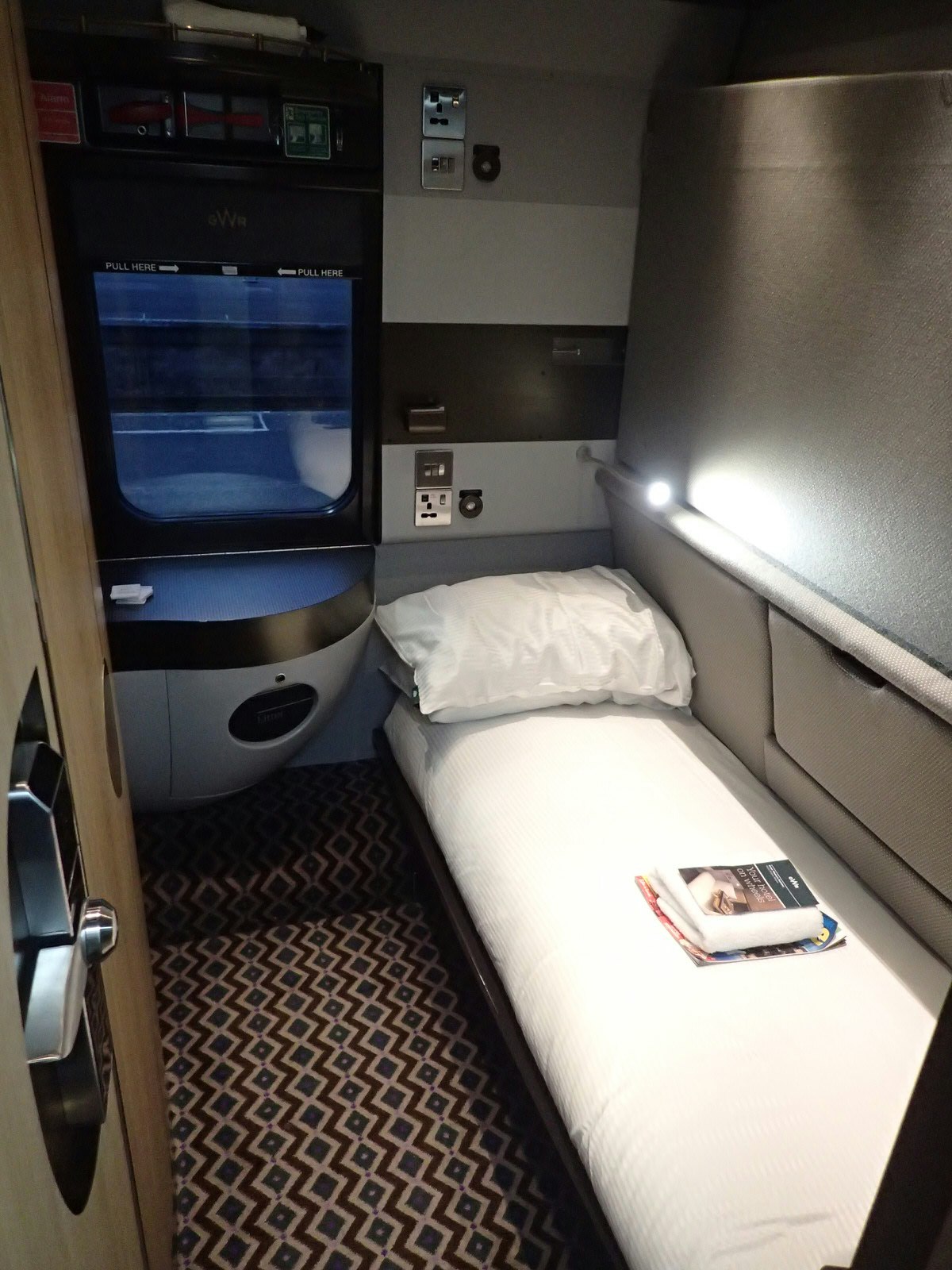Night Riviera sleeper train single bed compartment from Cornwall to Paddington Station, London