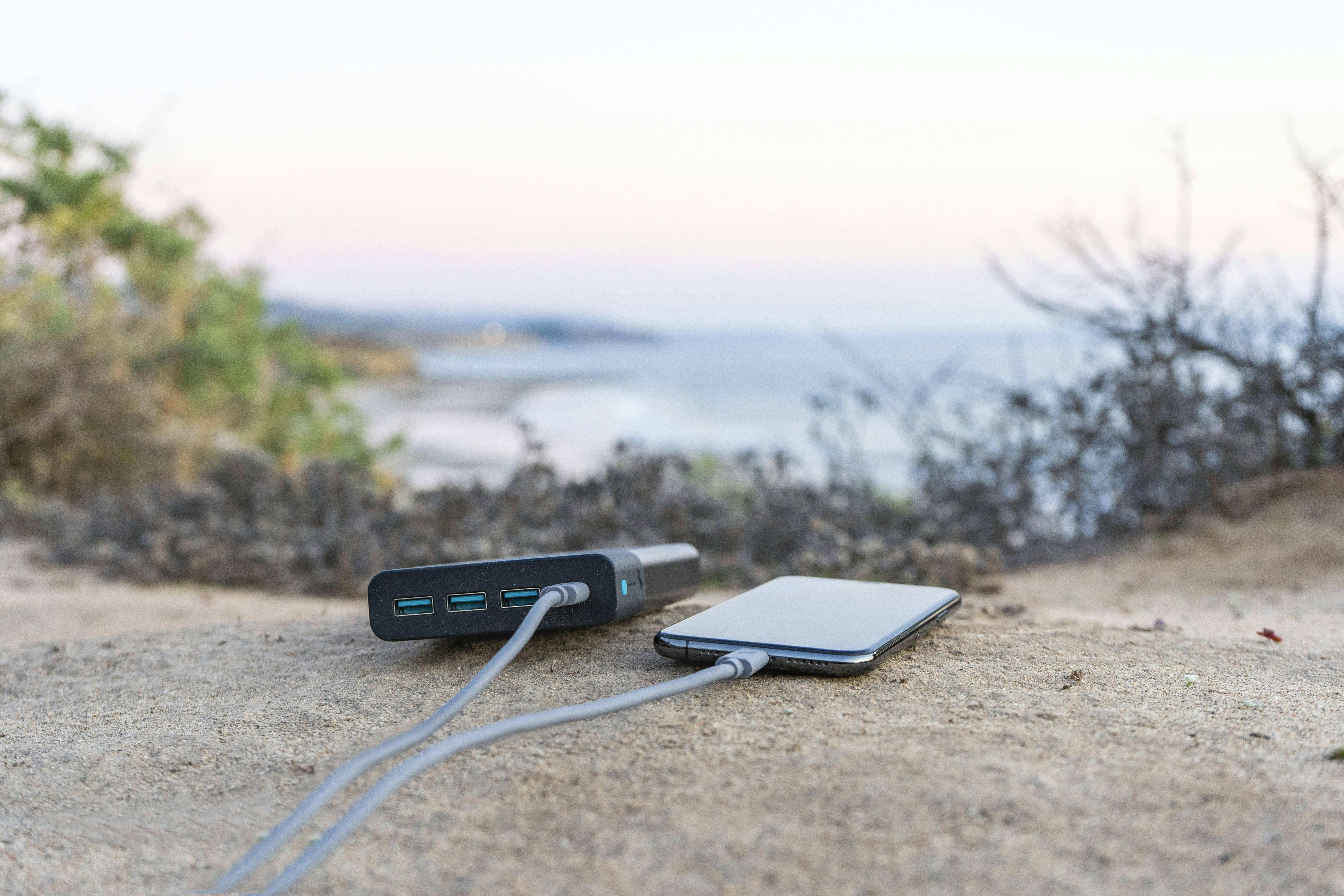 Nimble 10-day charger on a beach by the water