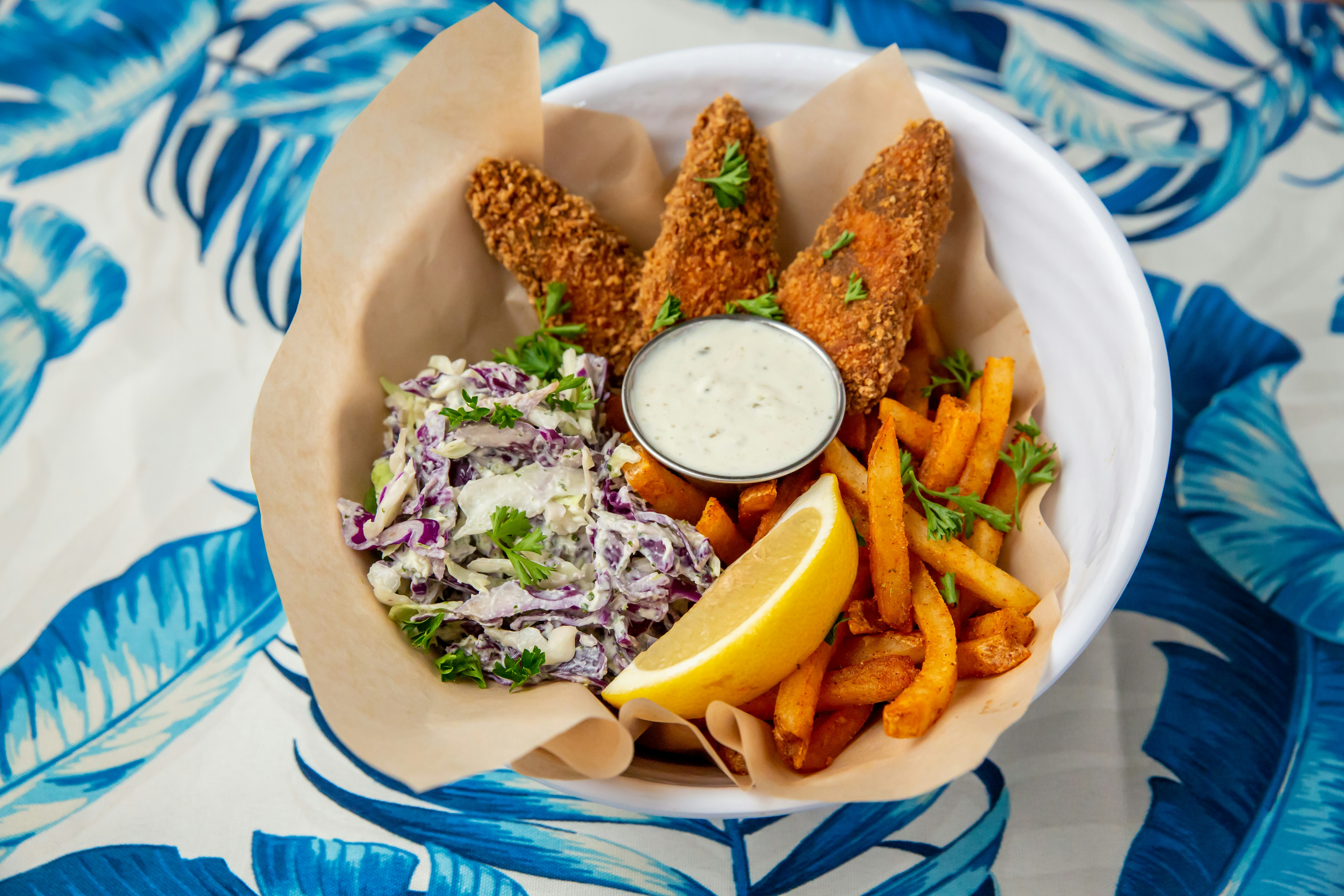 Fried tofu fish, fries and slaw with a wedge of lemon; Seattle vegan restaurants 