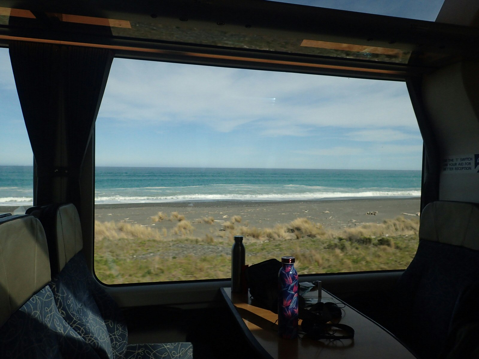 Ocean view from Coastal Pacific train, New Zealand.