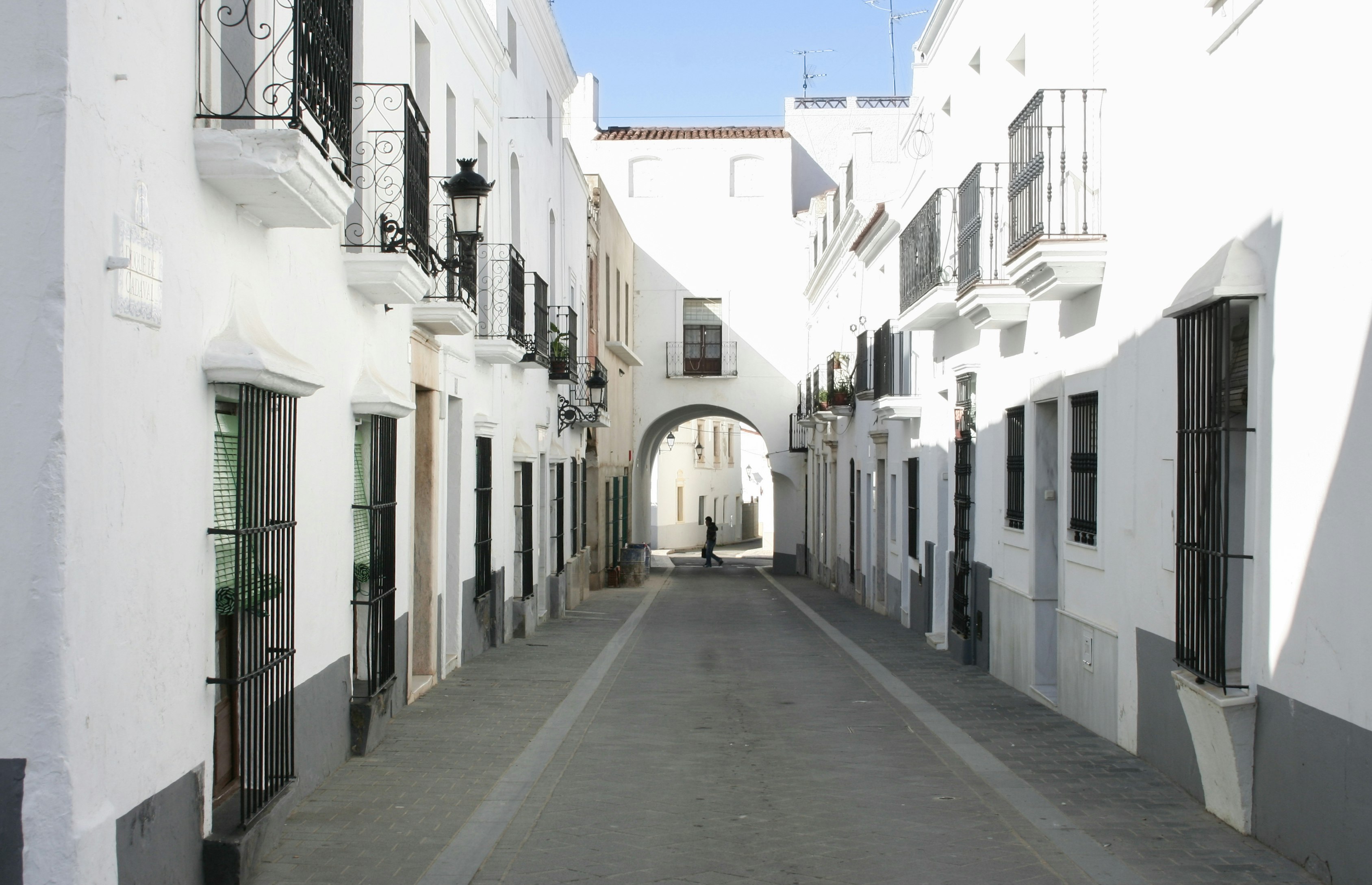 Typical whitewashed houses at village streets of Olivenza, Spain