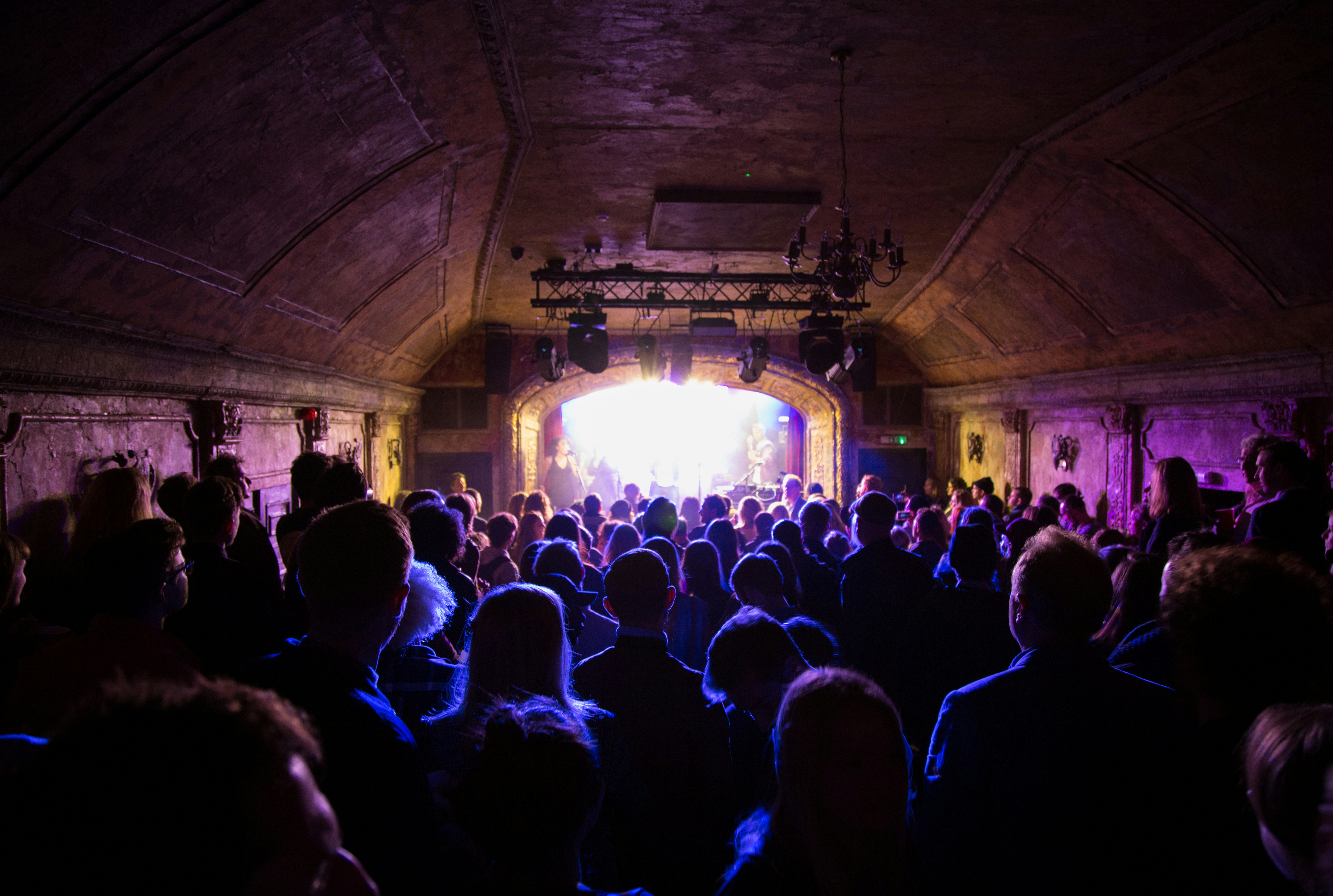 An audience view of the stage at Omeara, a small London music venue under a railway arch.