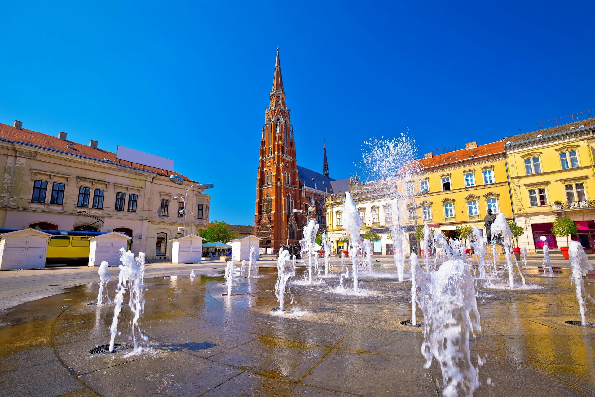 Osijek's main square fountain and cathedral