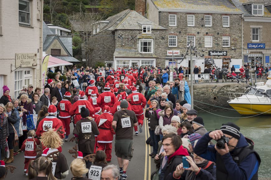 Santa and reindeer race at the Padstow Christmas Festival, raising money for Cornwall Hospice Care.