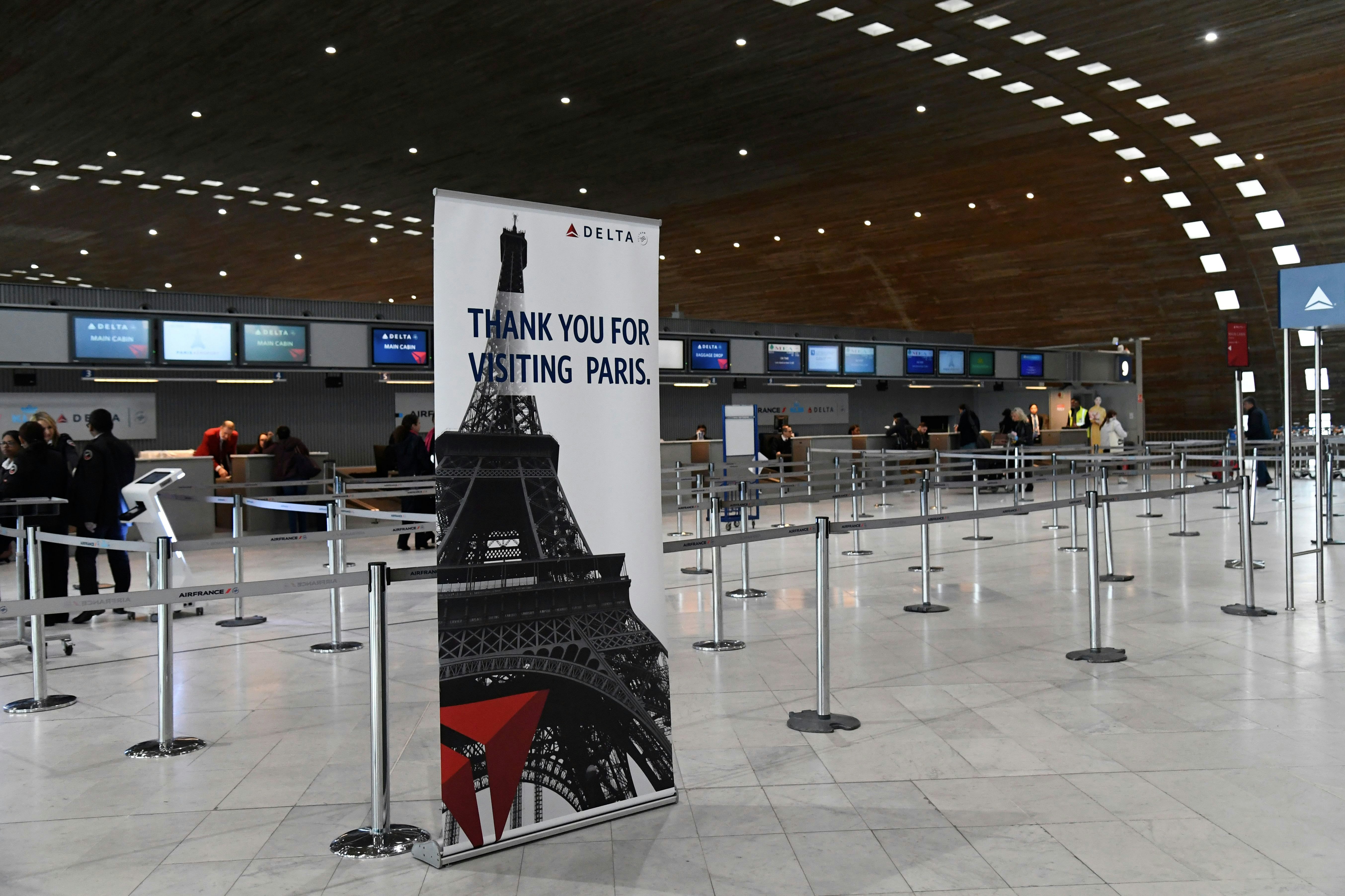 Empty Delta Airlines check-in desk at Paris-Charles-de-Gaulle airport 